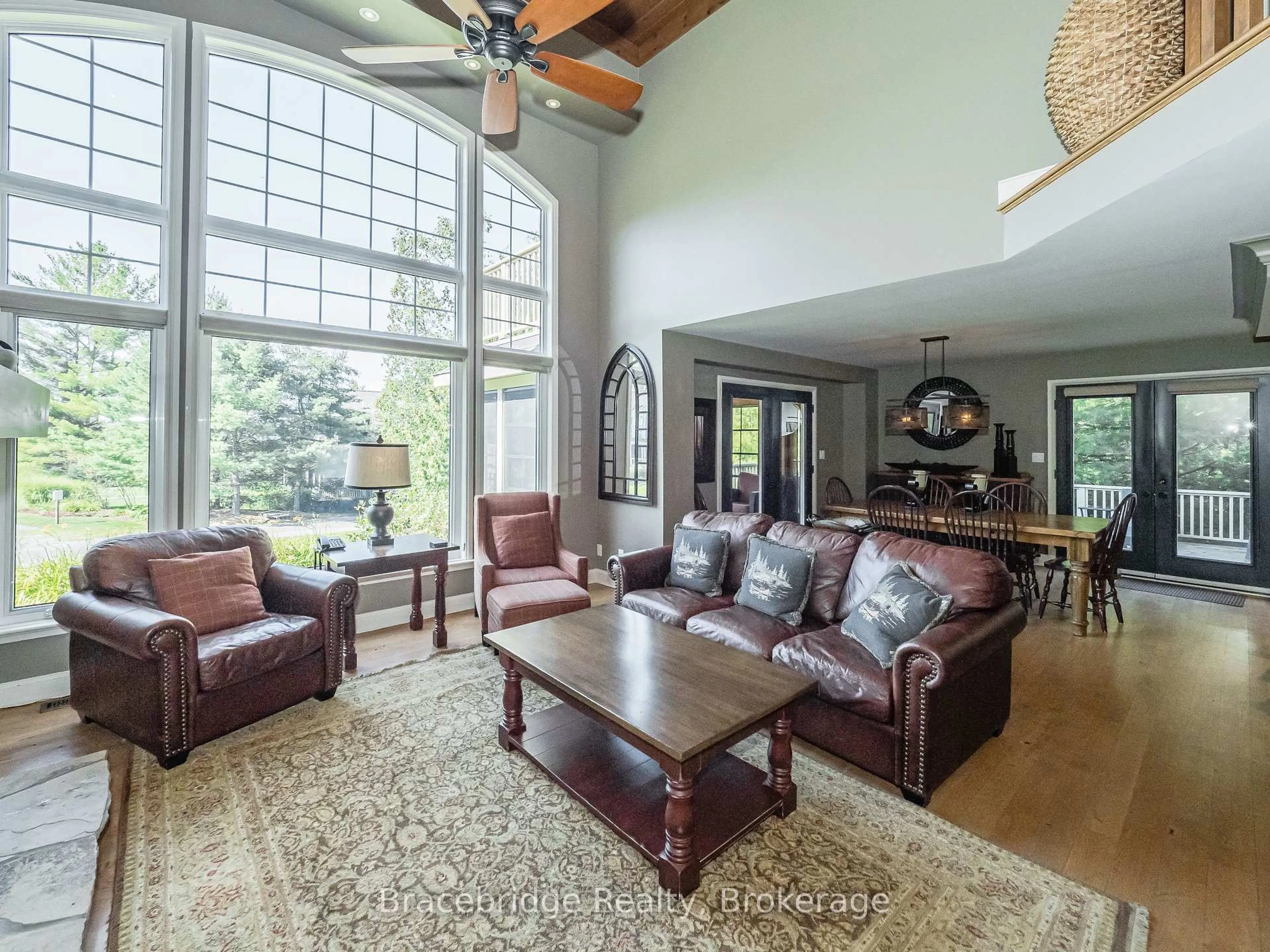 Living room with furniture, unknown for 3876 Muskoka Rd 118 Highway #Sandfield 8 W4, Muskoka Lakes Ontario P0B 1J0