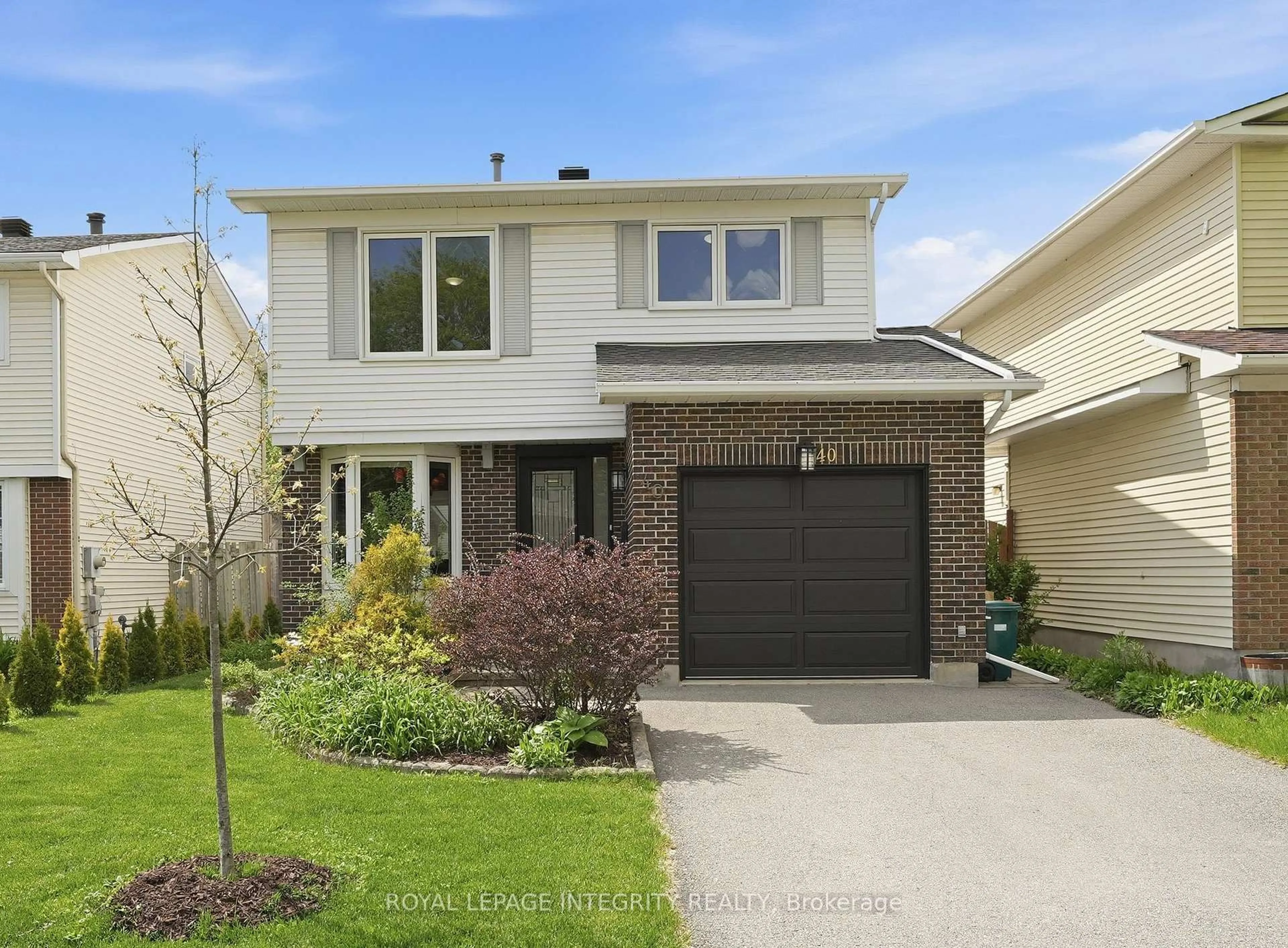 Home with brick exterior material, street for 40 Barra Ave, Kanata Ontario K2L 2S1
