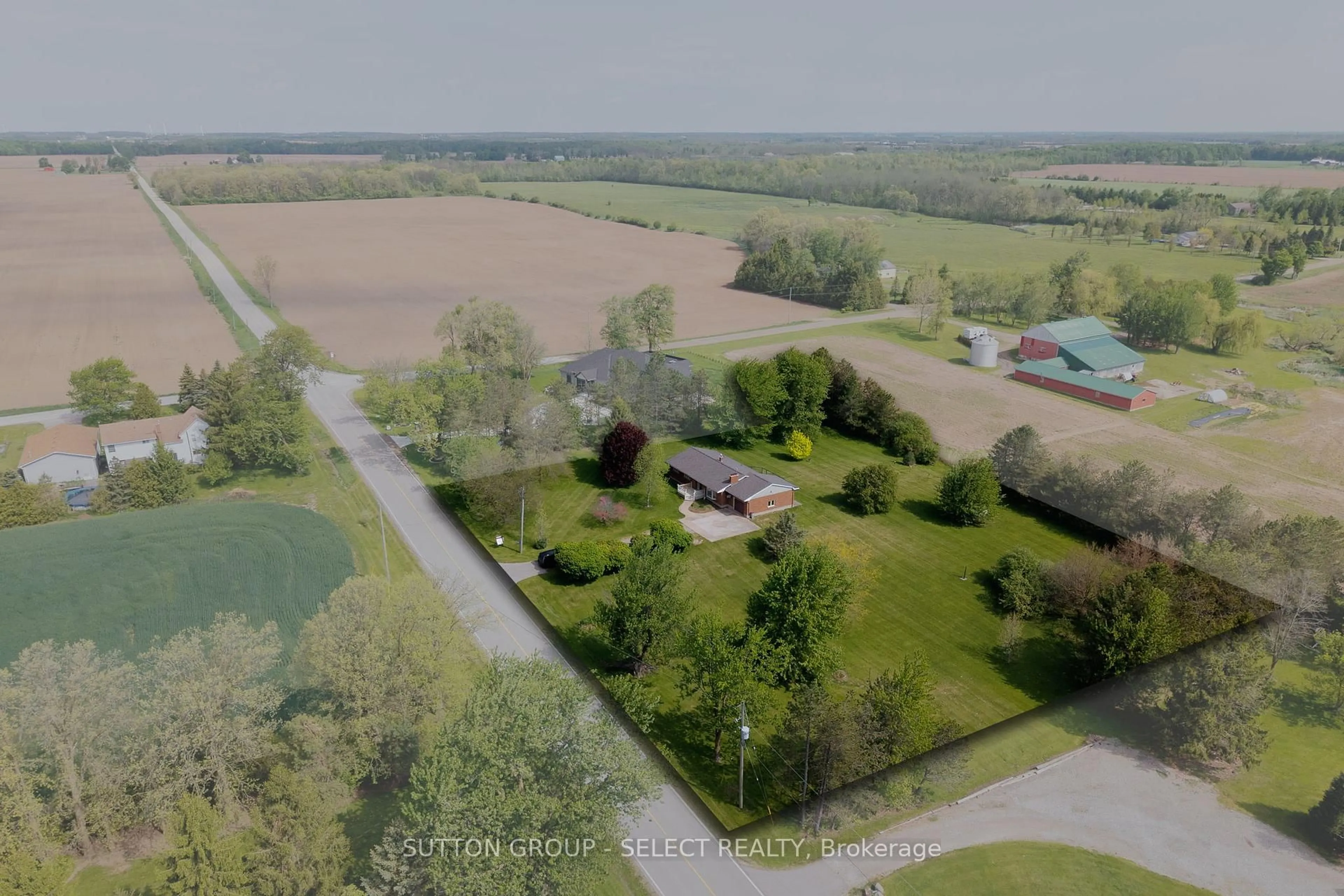 A pic from outside/outdoor area/front of a property/back of a property/a pic from drone, unknown for 25752 Poplar Hill Rd, Middlesex Centre Ontario N0M 1P0