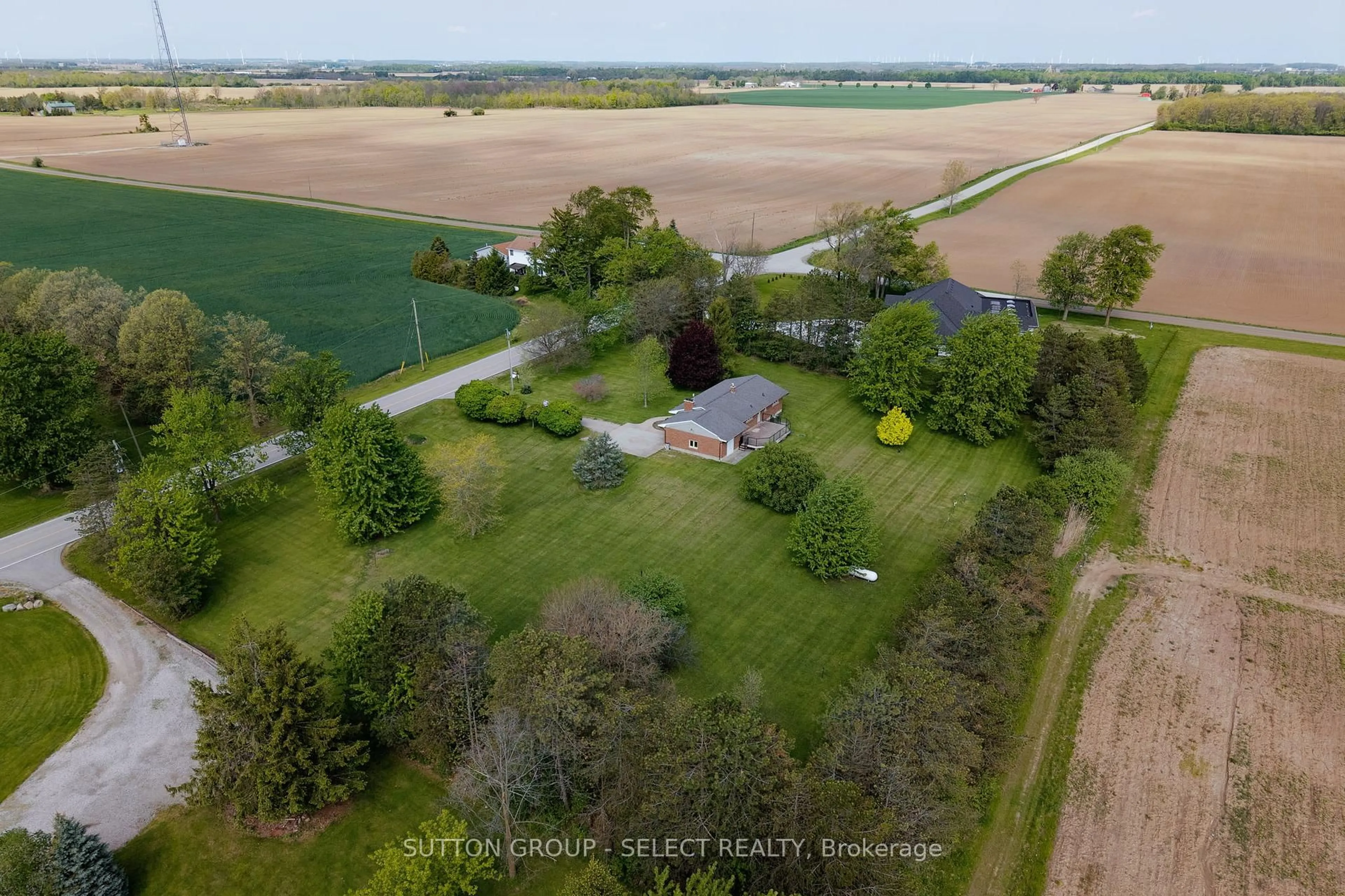 A pic from outside/outdoor area/front of a property/back of a property/a pic from drone, unknown for 25752 Poplar Hill Rd, Middlesex Centre Ontario N0M 1P0