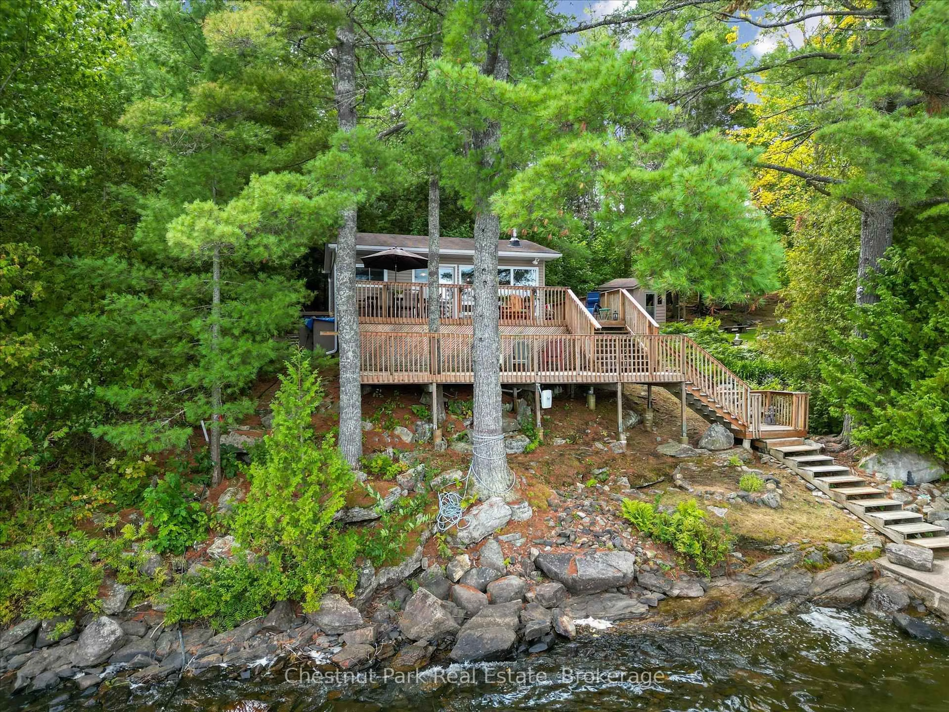 A pic from outside/outdoor area/front of a property/back of a property/a pic from drone, water/lake/river/ocean view for 1492 #3 North Shore Rd, Muskoka Lakes Ontario P0B 1M0