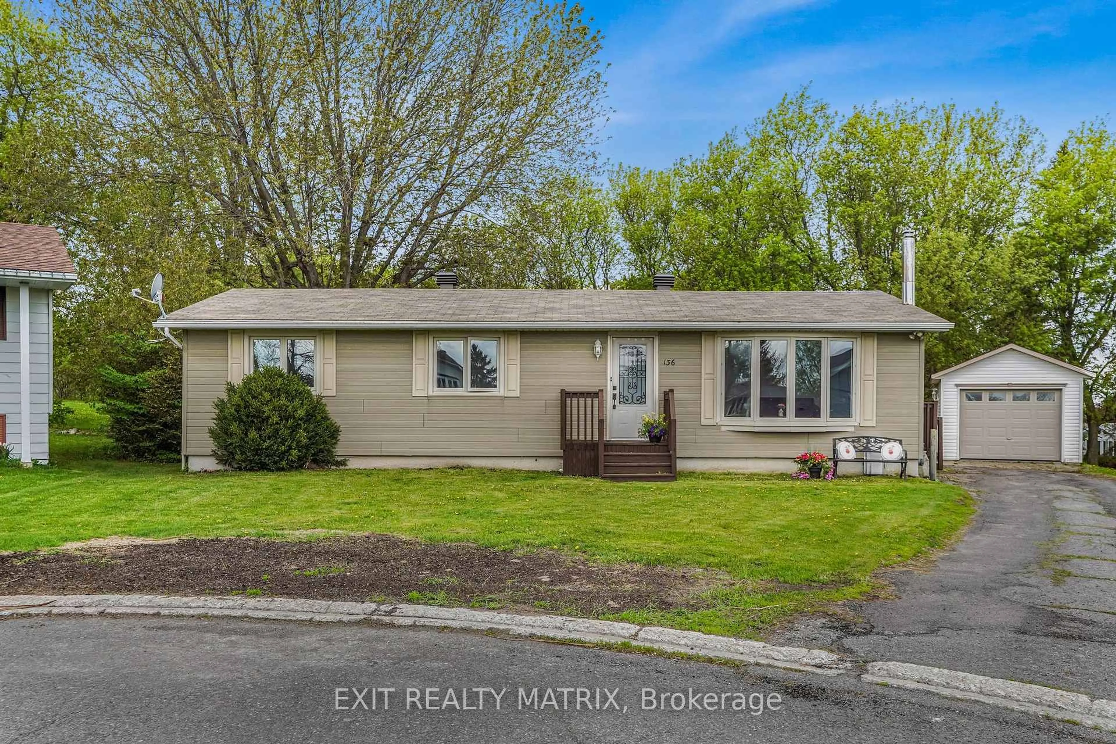 Home with vinyl exterior material, street for 136 Martel Cres, Champlain Ontario K0B 1R0