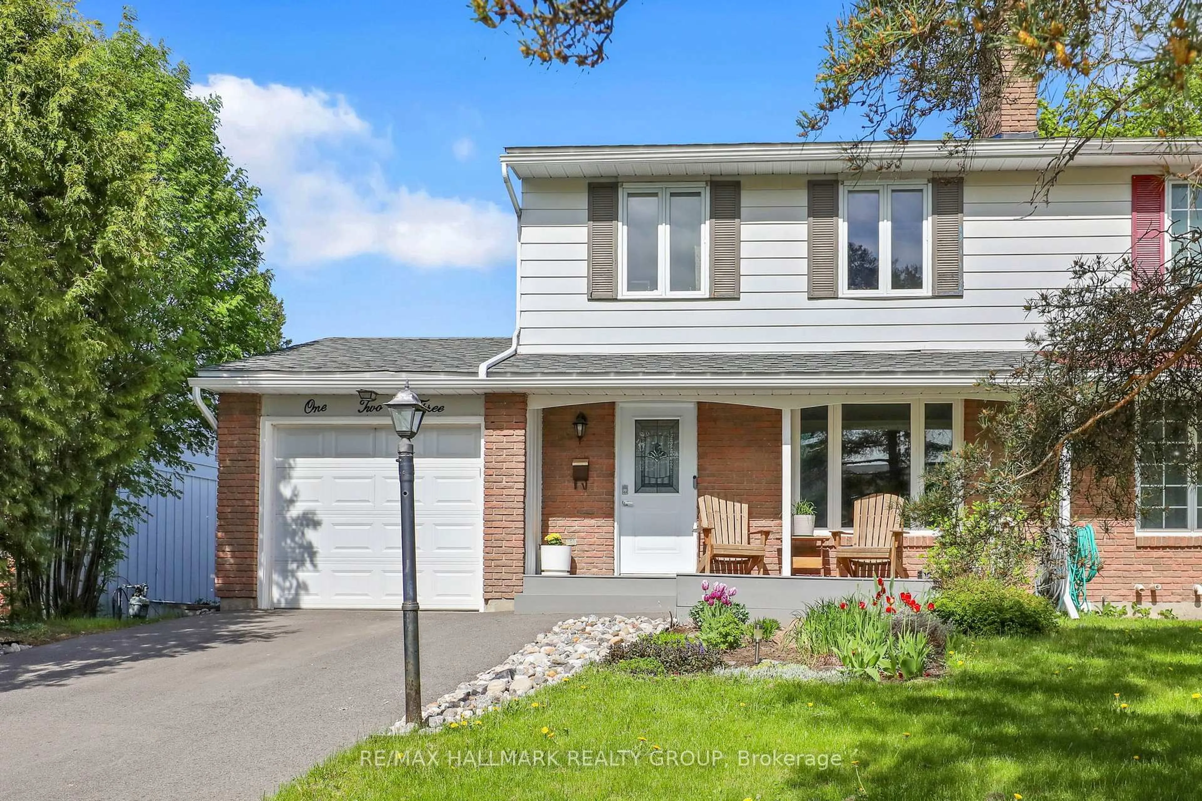 Home with vinyl exterior material, street for 123 Mcclellan Rd, Ottawa Ontario K2H 5V7