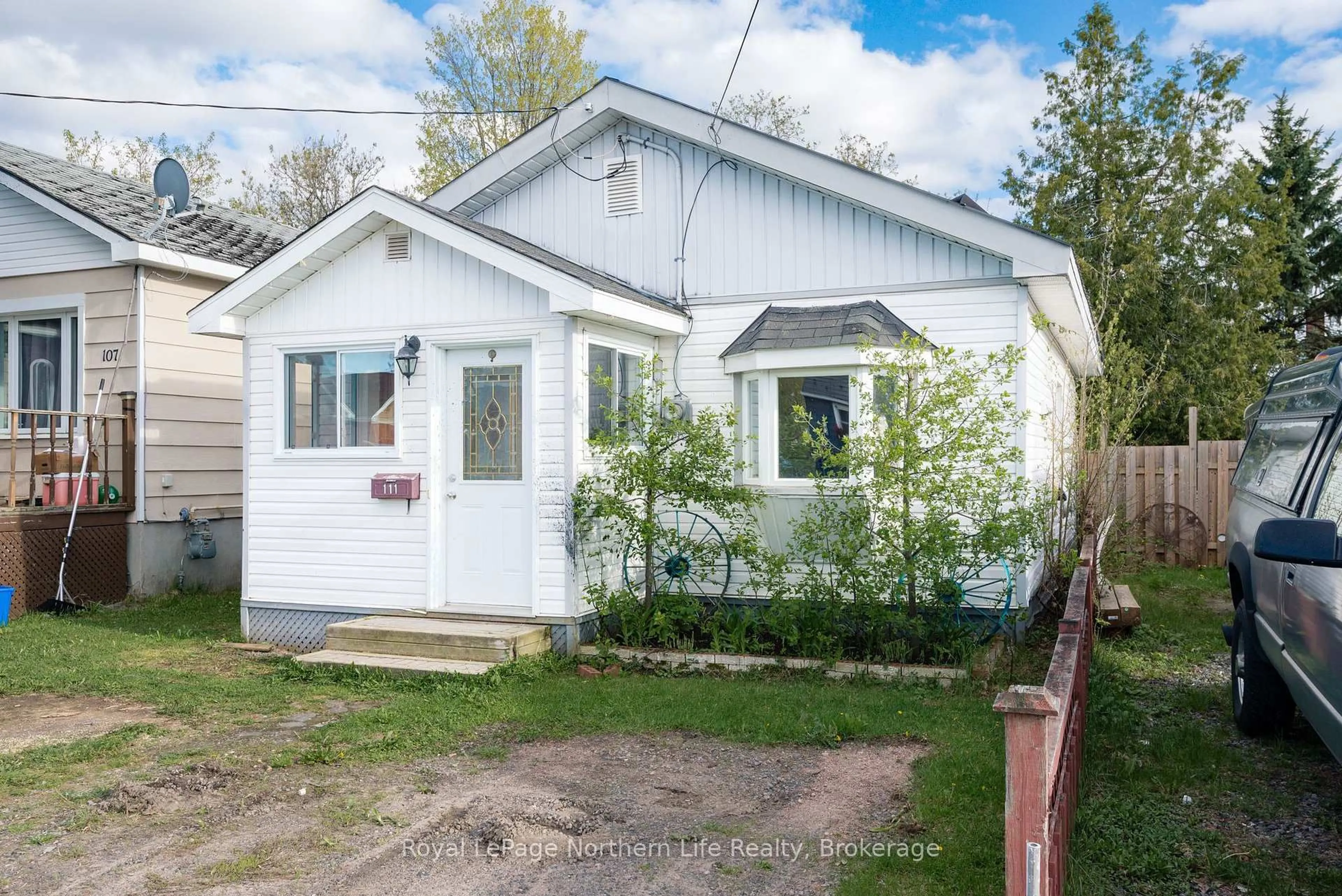 Home with vinyl exterior material, street for 111 Norwood Ave, North Bay Ontario P1B 5C9