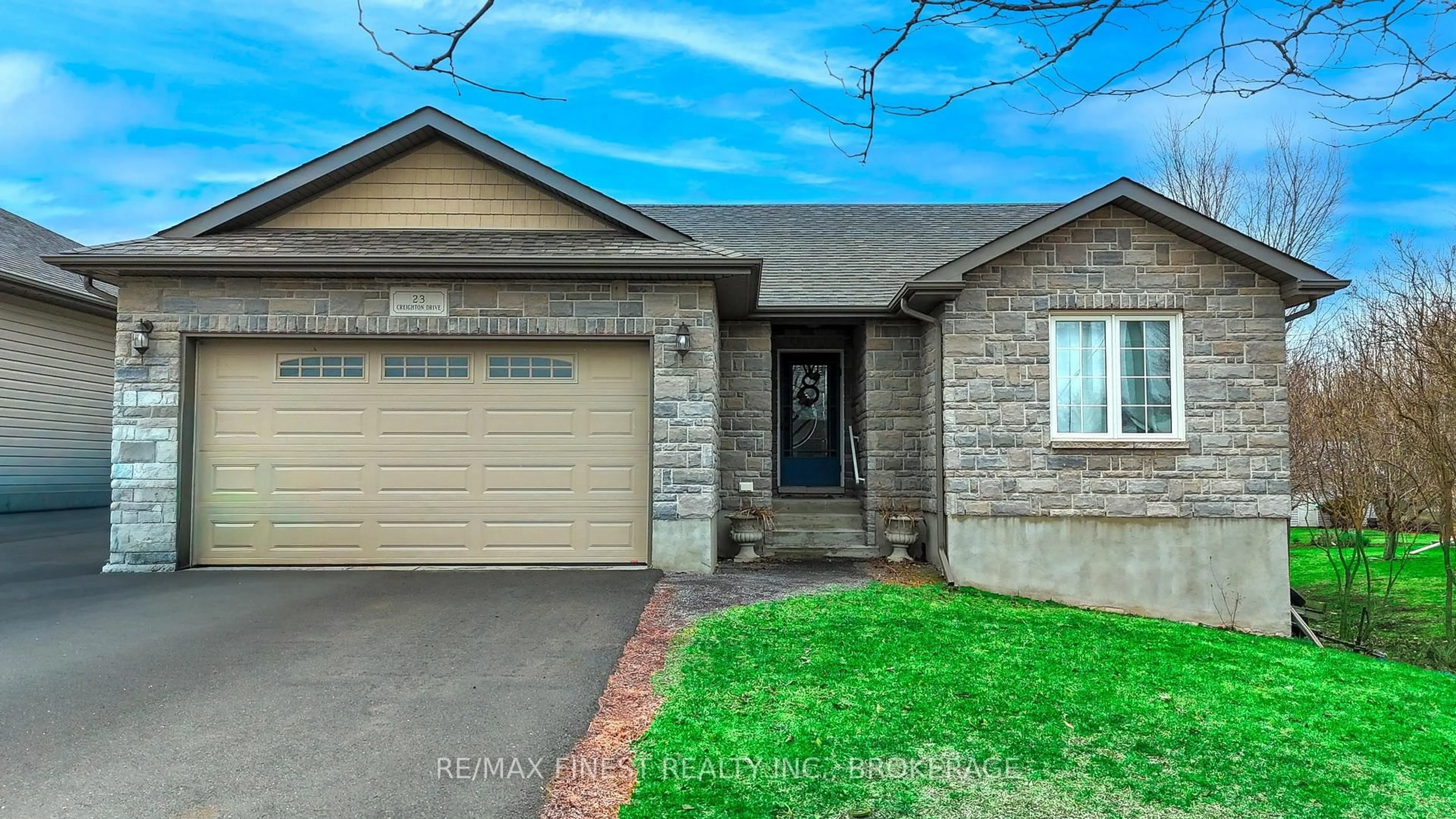 Home with brick exterior material, street for 23 Creighton Dr, Bissett Creek Ontario K0H 2H0