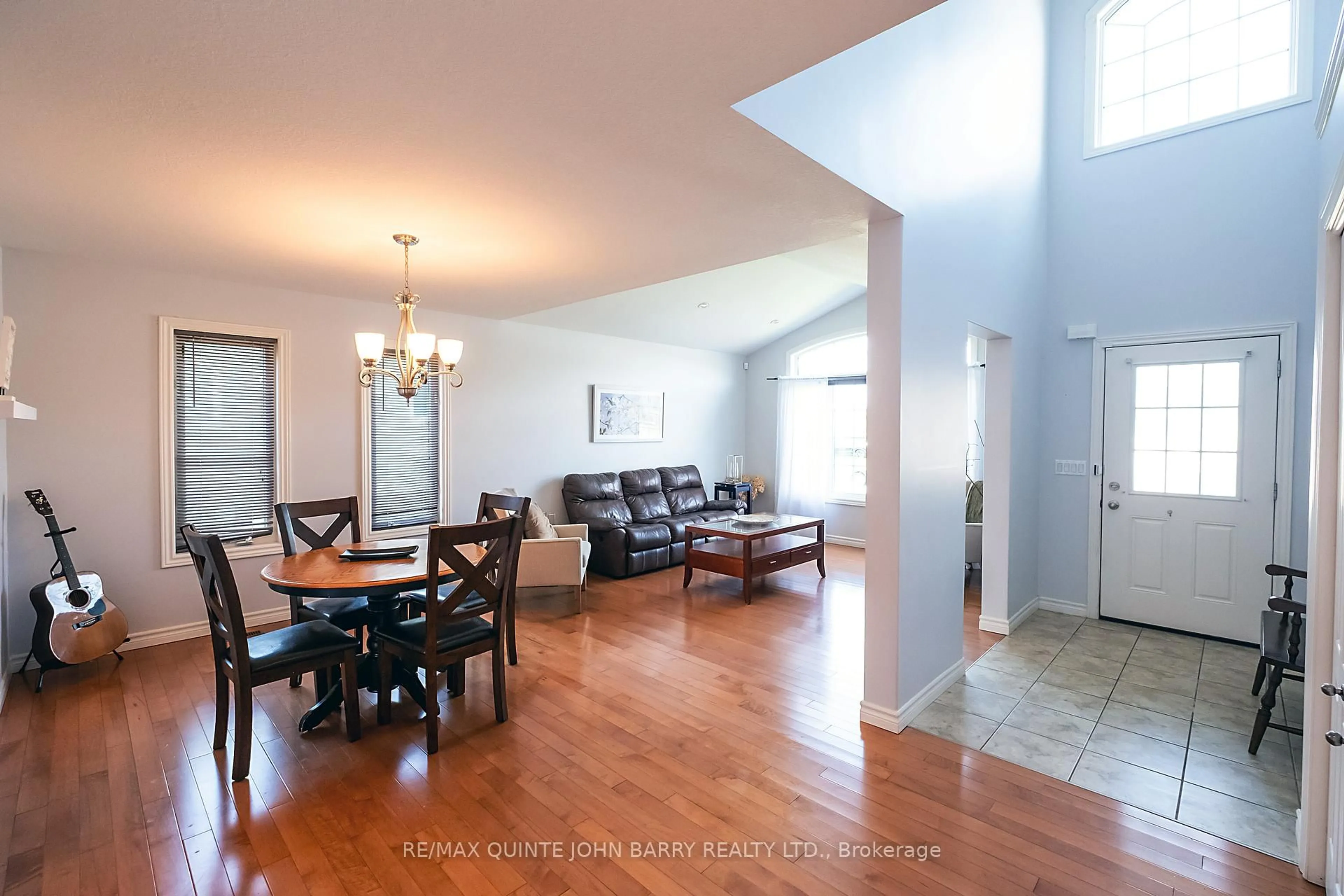 Living room with furniture, wood/laminate floor for 3 Spencer Crt, Quinte West Ontario K8V 6X7