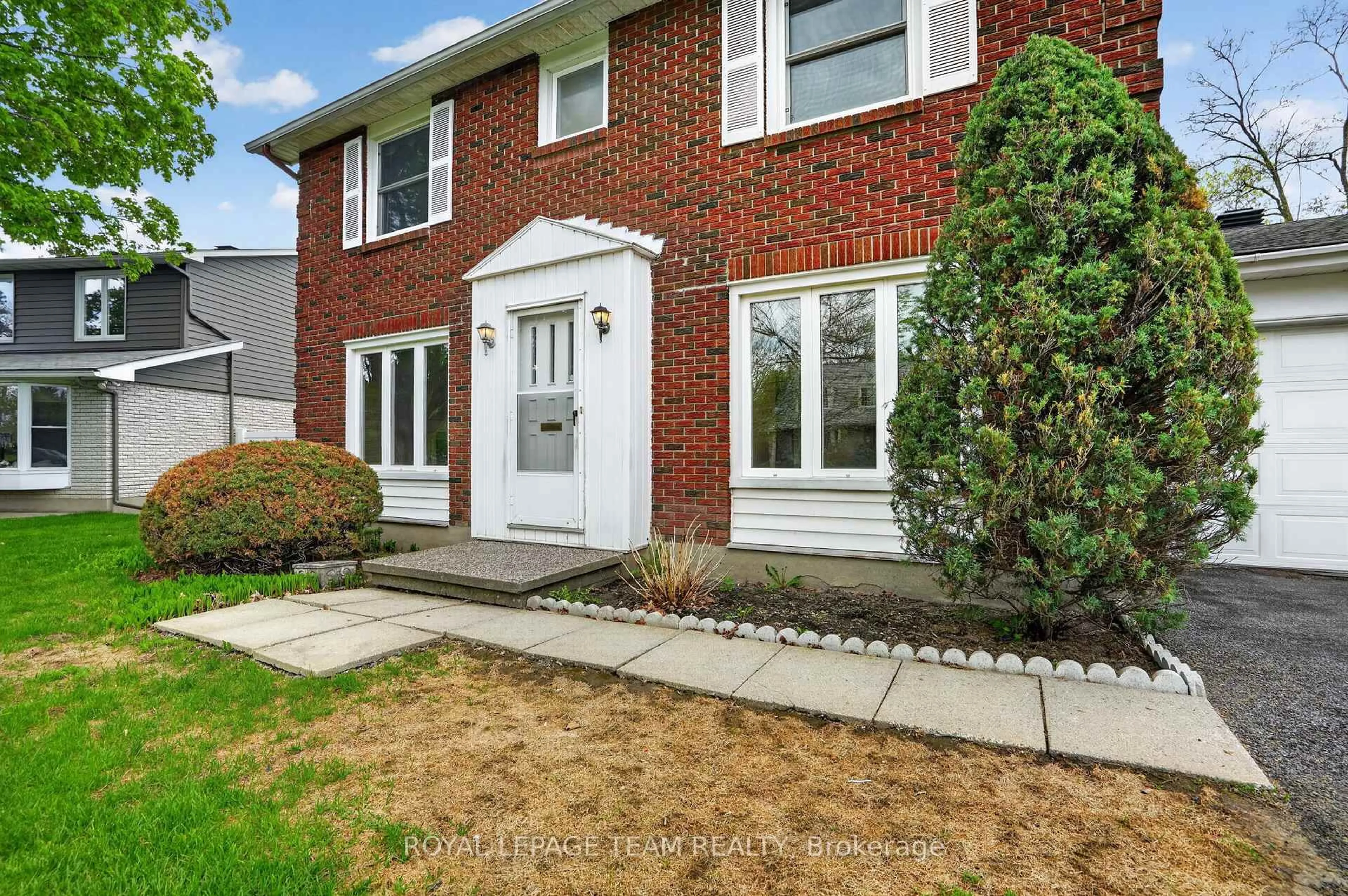 Home with brick exterior material, street for 16 Parkglen Dr, Ottawa Ontario K2G 3G9