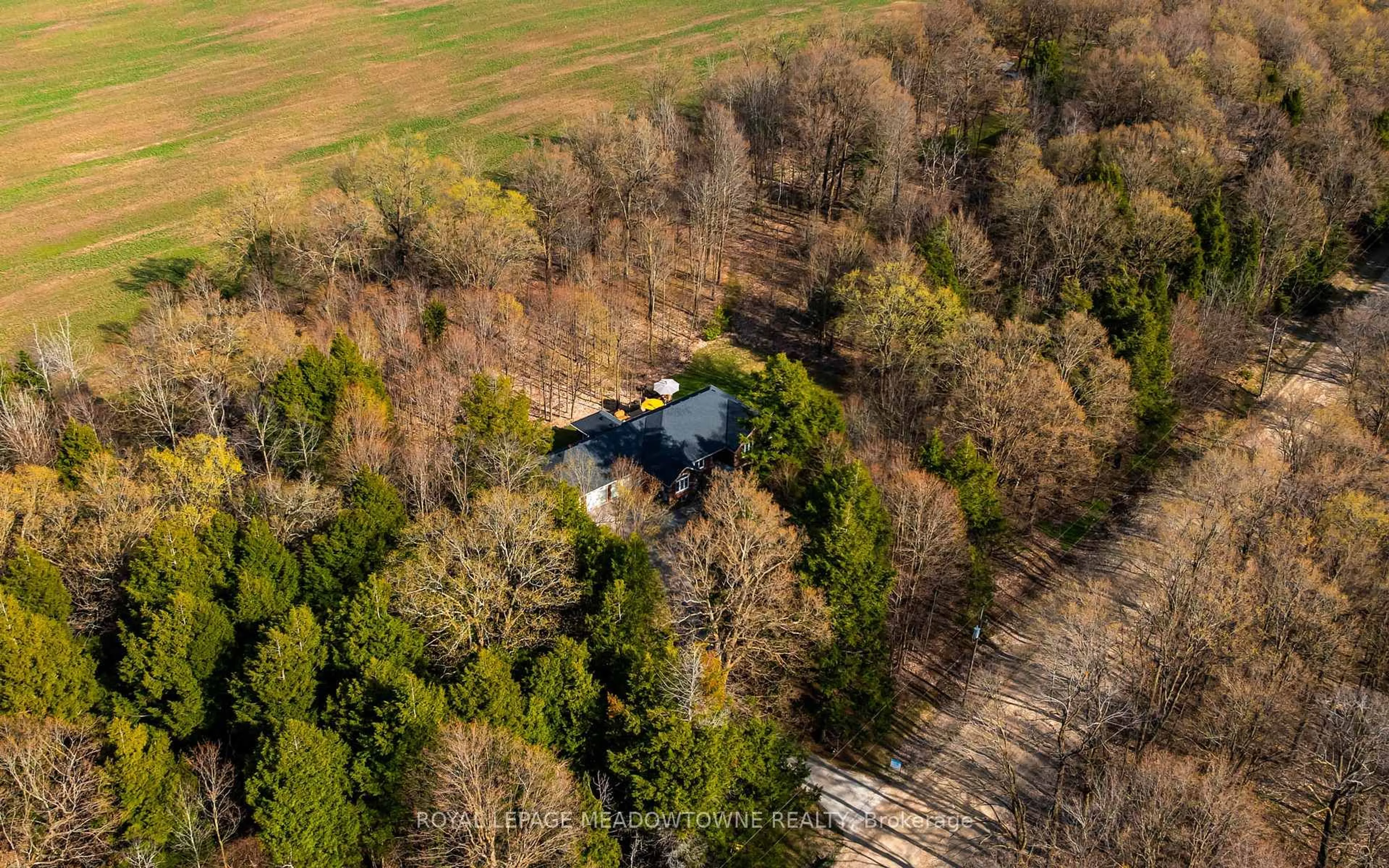 A pic from outside/outdoor area/front of a property/back of a property/a pic from drone, forest/trees view for 834603 4th Line Ehs, Mono Ontario L9W 5Z7