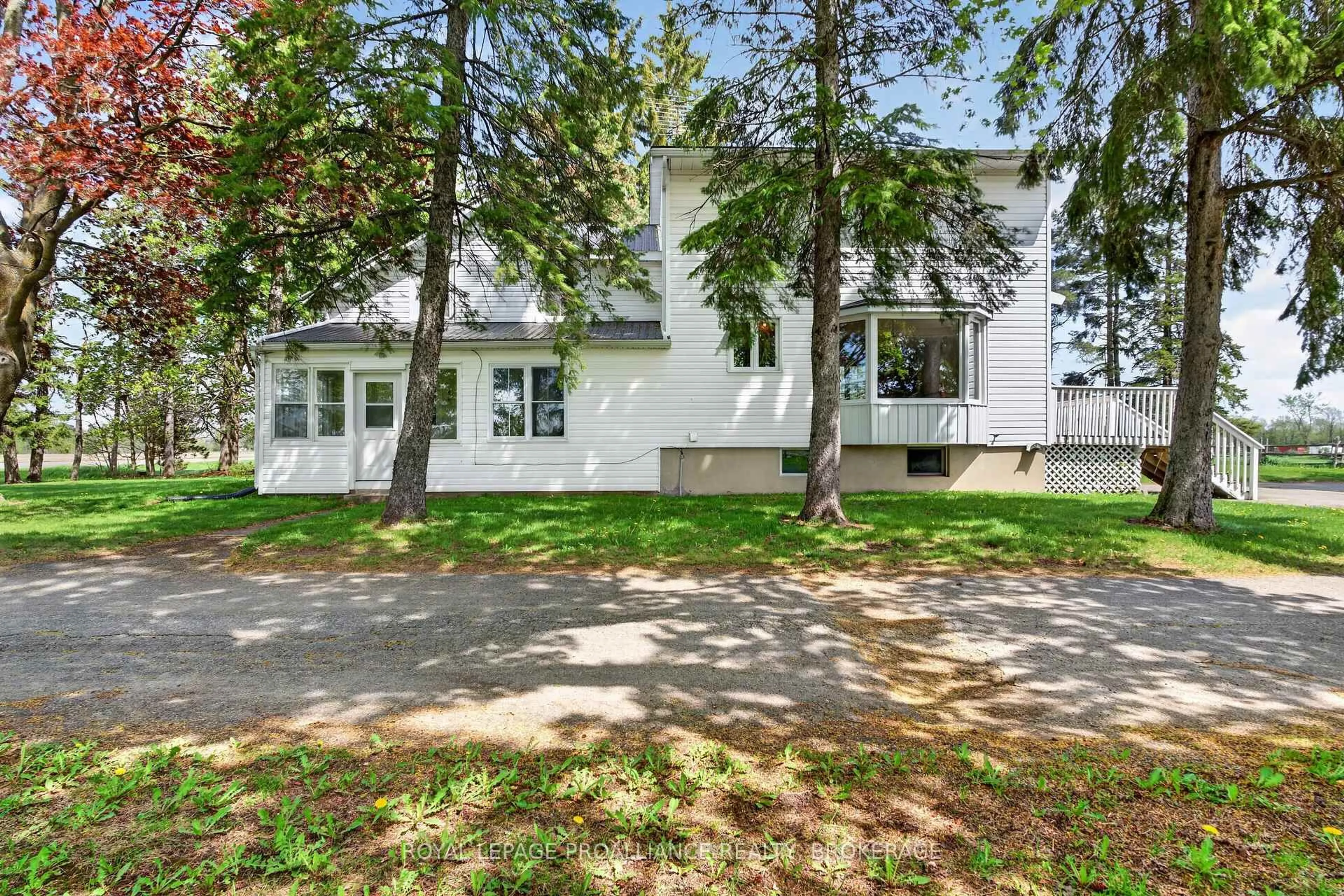 Home with vinyl exterior material, street for 5480 Highway 38 Highway, Harrowsmith Ontario K0H 1V0