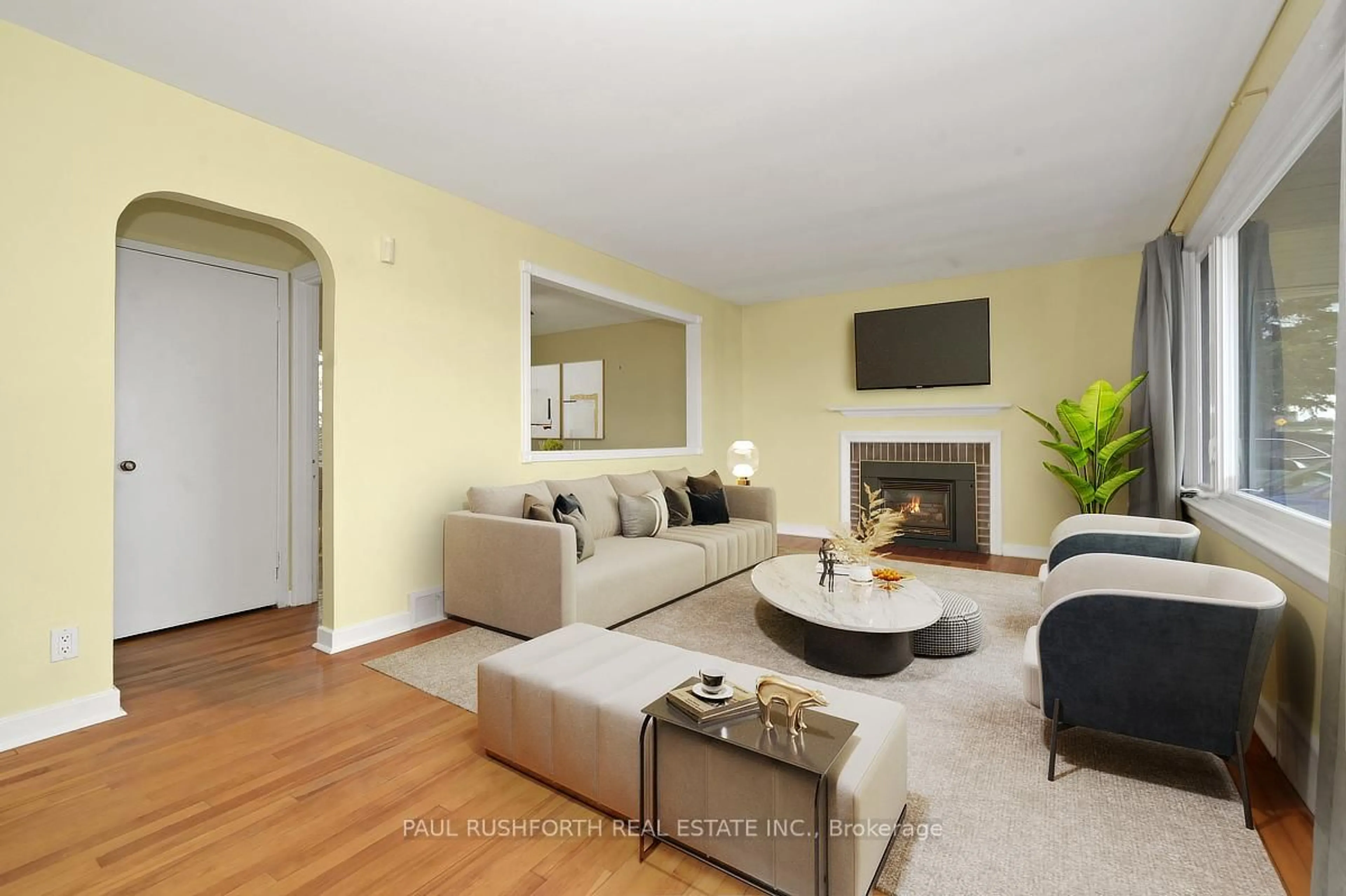Living room with furniture, wood/laminate floor for 156 Baseline Rd, Ottawa Ontario K2C 0A2