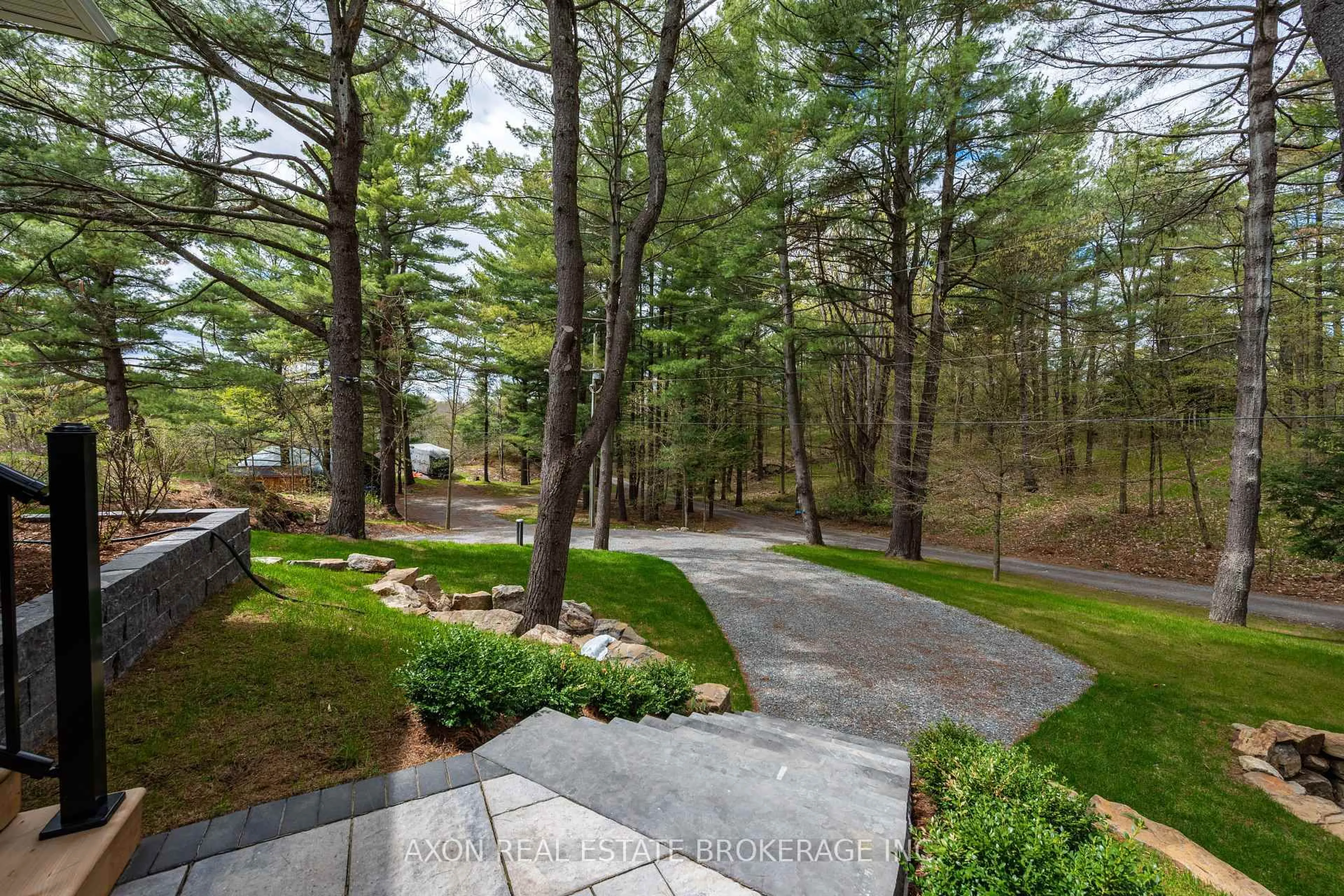 Patio, forest/trees view for 1022 Briscoe Bay Lane, Battersea Ontario K0H 1H0