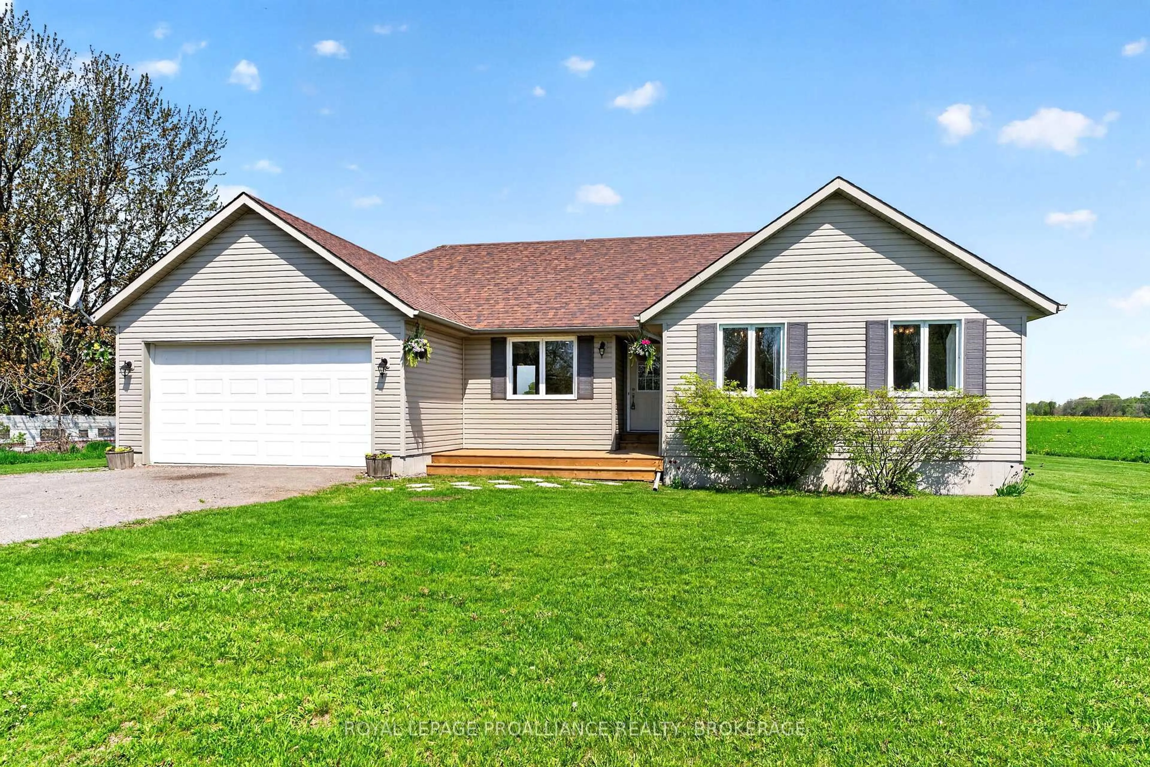 Home with vinyl exterior material, street for 15268 County Road 21, Brighton Ontario K0K 1H0