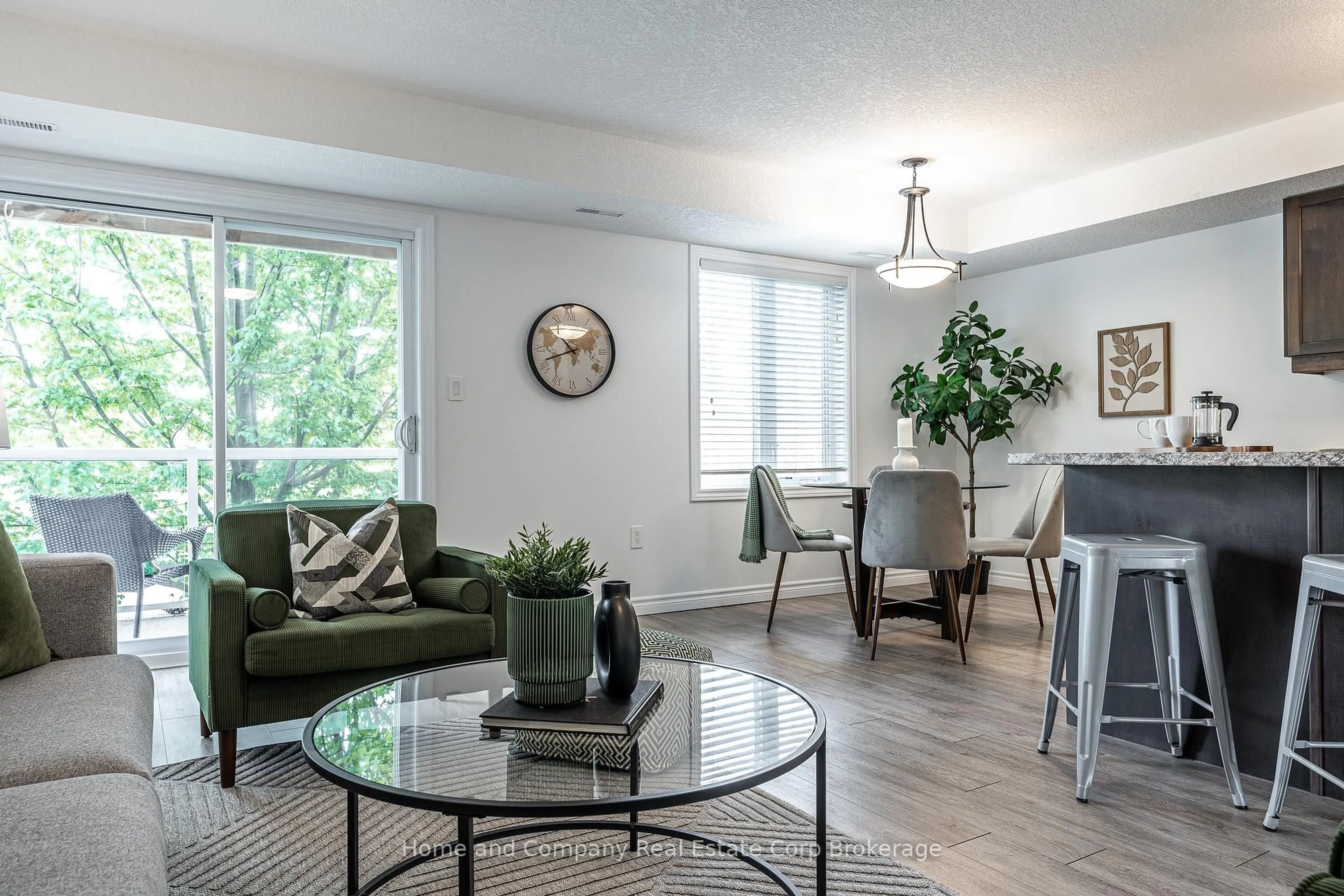 Living room with furniture, wood/laminate floor for 148 Borden St #4, Stratford Ontario N5A 0G1