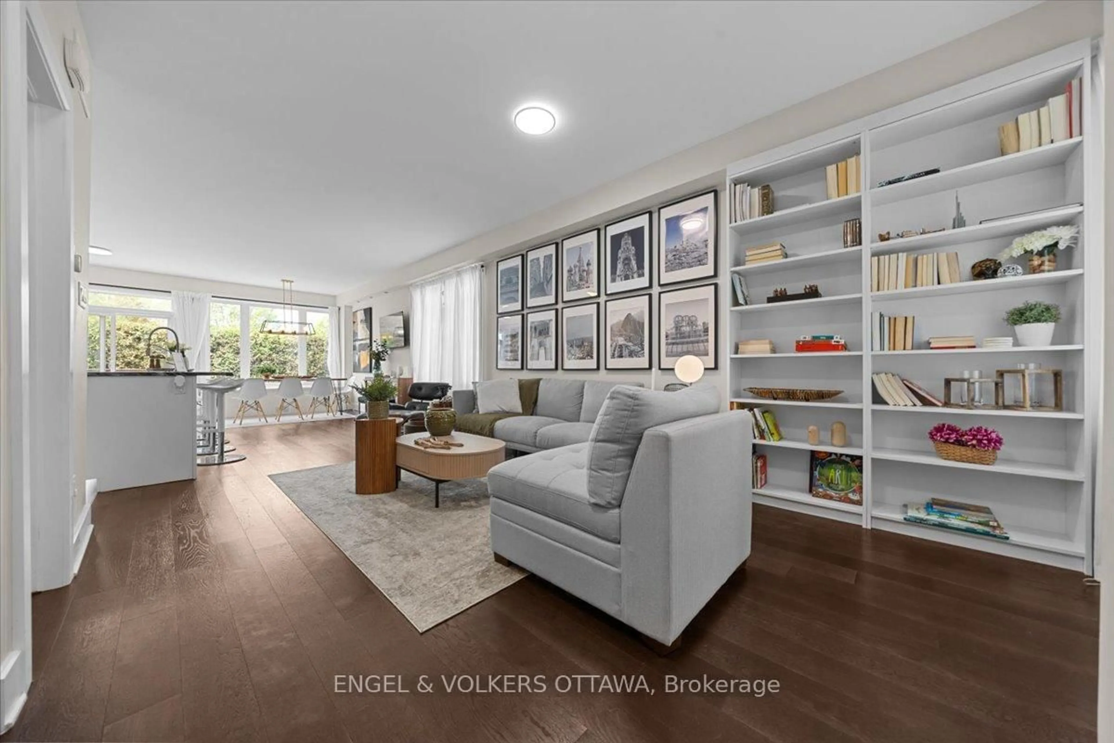 Living room with furniture, wood/laminate floor for 209 Bert Hall St, Arnprior Ontario K7S 0H1