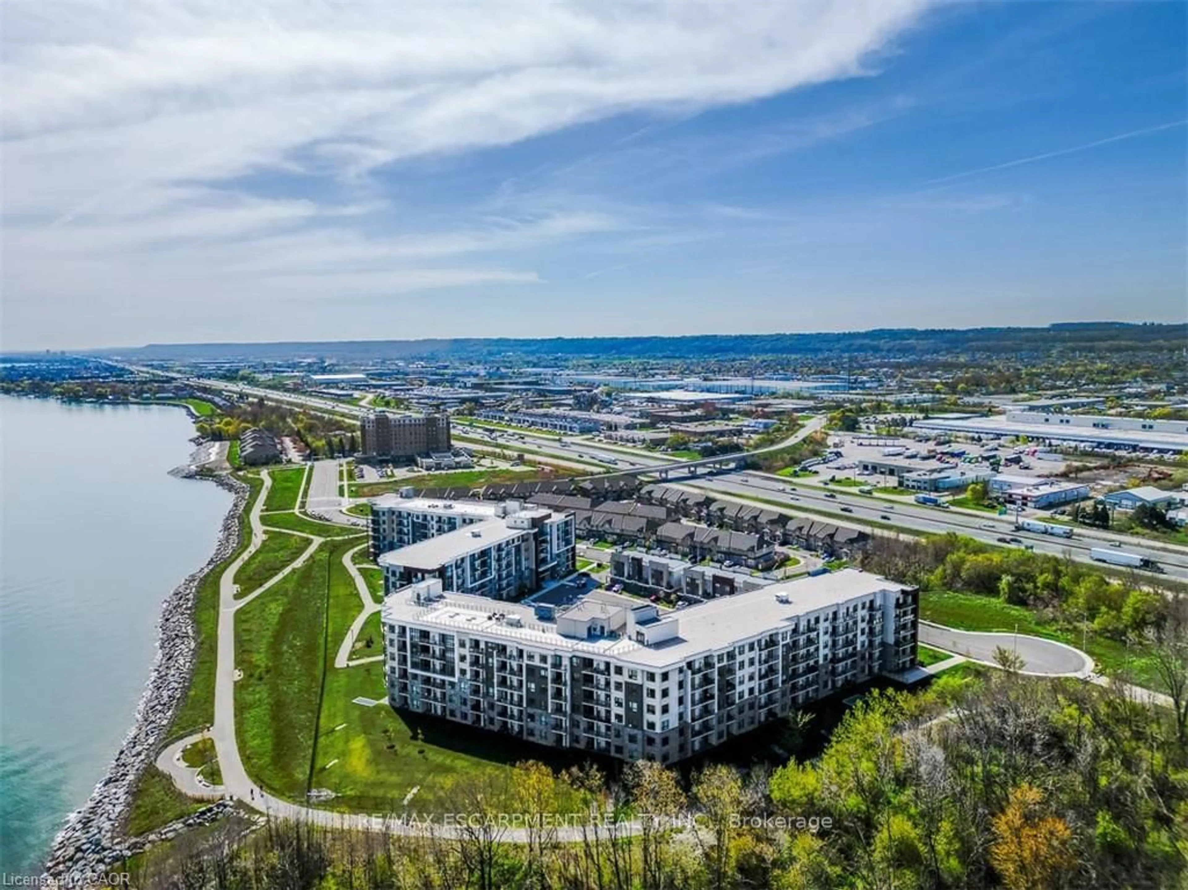 A pic from outside/outdoor area/front of a property/back of a property/a pic from drone, water/lake/river/ocean view for 125 Shoreview Pl #102, Hamilton Ontario L8E 0K3