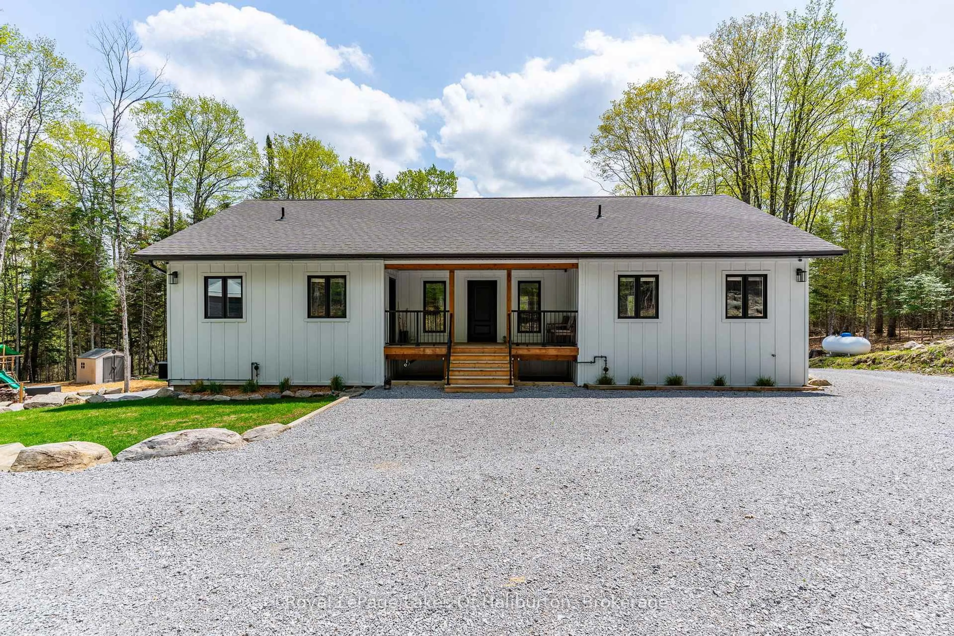 Home with brick exterior material, street for 51 Glebe Rd, Dysart et al Ontario K0M 1S0
