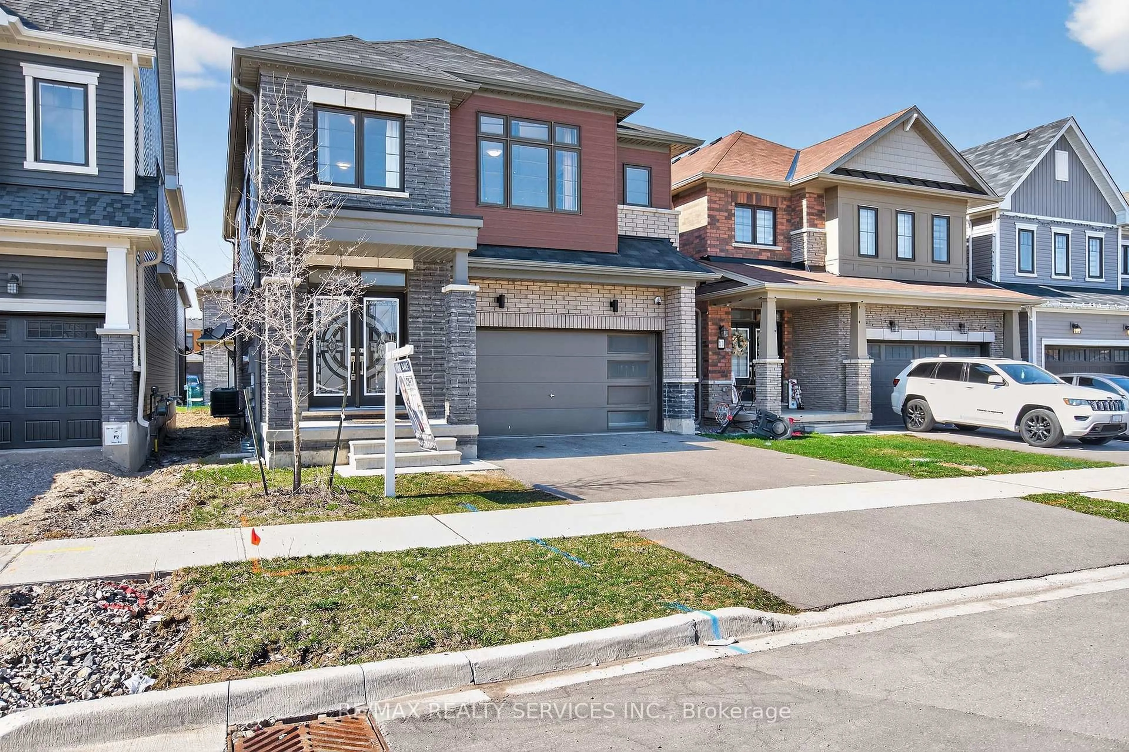 Home with brick exterior material, street for 12 Ladd Ave, Brantford Ontario N3T 0S3