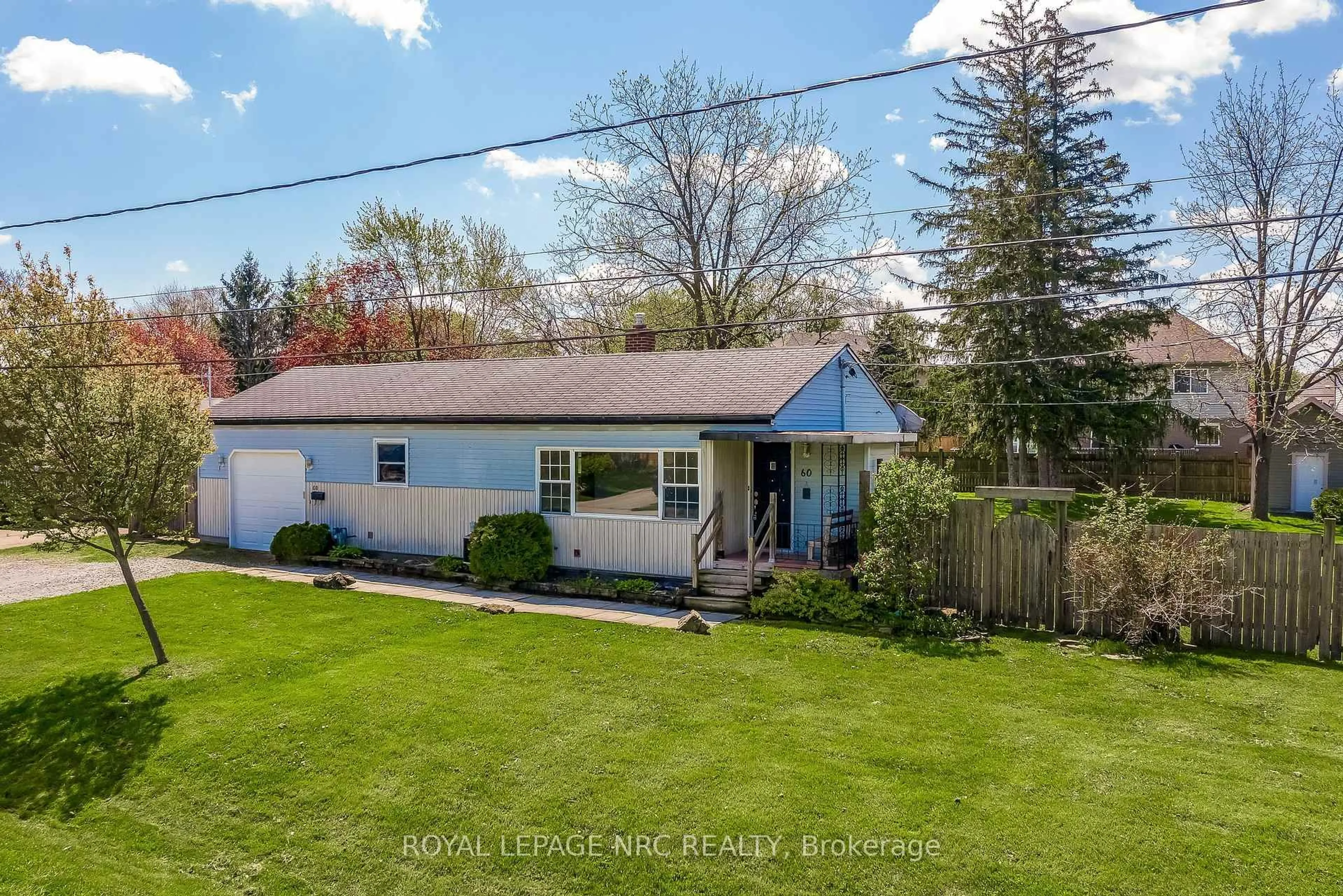 A pic from outside/outdoor area/front of a property/back of a property/a pic from drone, street for 60 Valley Rd, St. Catharines Ontario L2S 1Y6
