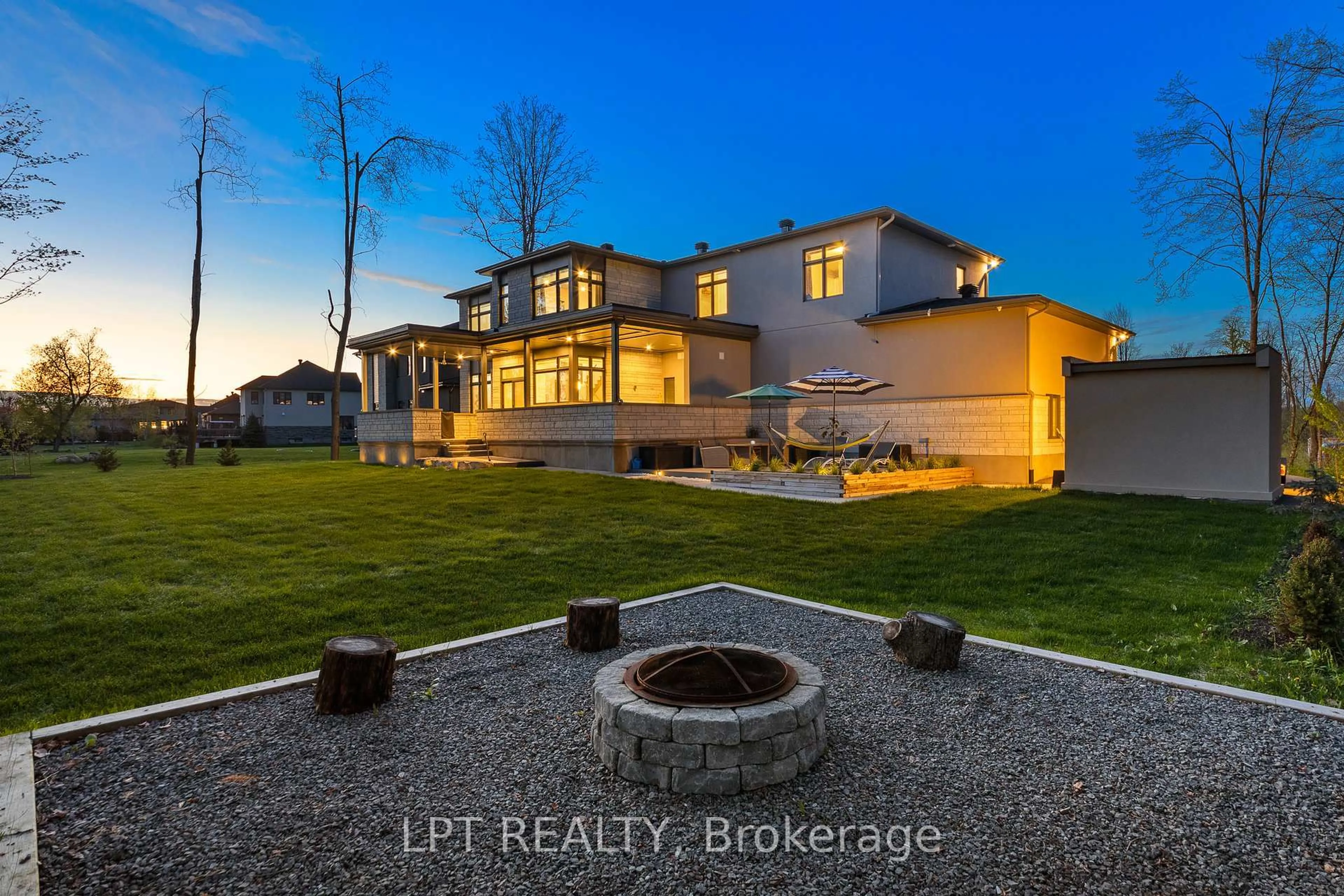 A pic from outside/outdoor area/front of a property/back of a property/a pic from drone, water/lake/river/ocean view for 589 Shoreway Dr, Greely Ontario K4P 0G3