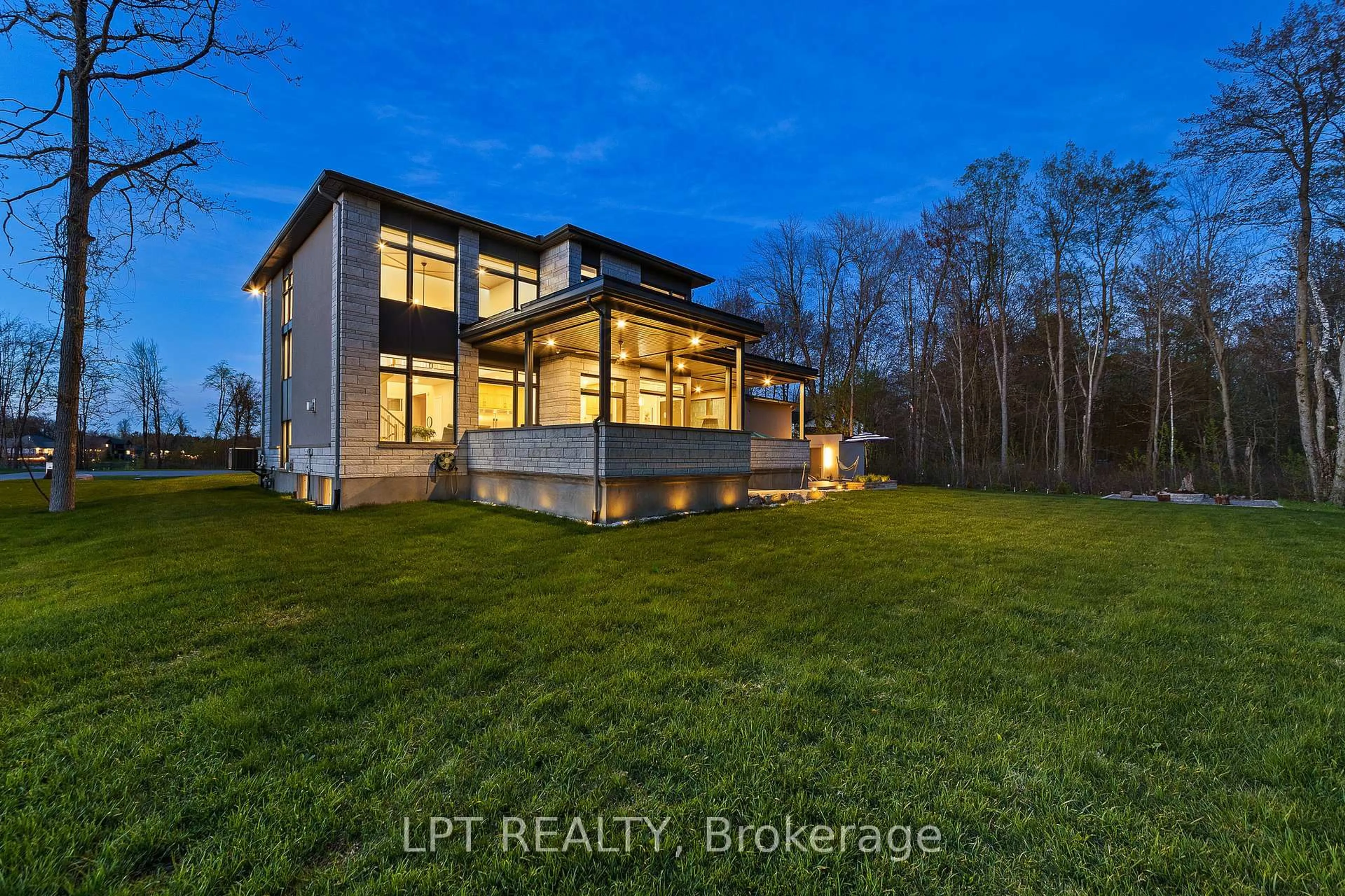 A pic from outside/outdoor area/front of a property/back of a property/a pic from drone, water/lake/river/ocean view for 589 Shoreway Dr, Greely Ontario K4P 0G3