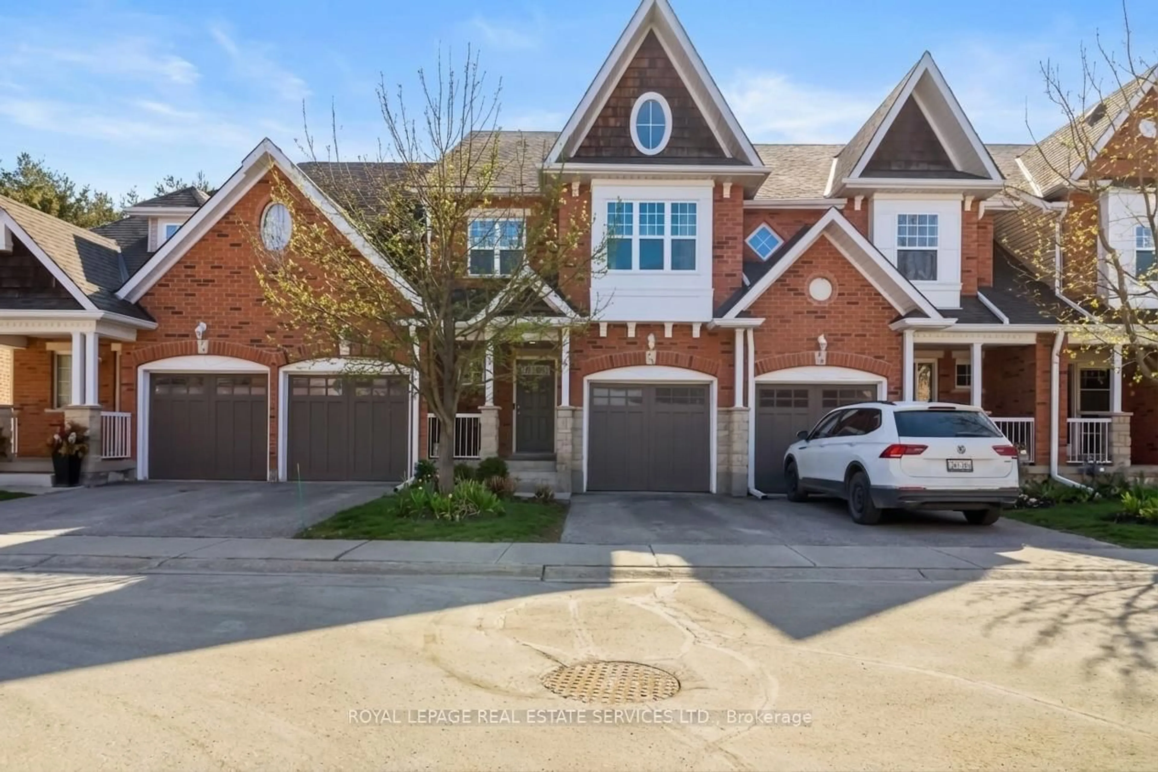 Home with brick exterior material, street for 165 Terraview Cres #48, Guelph Ontario N1G 5G7