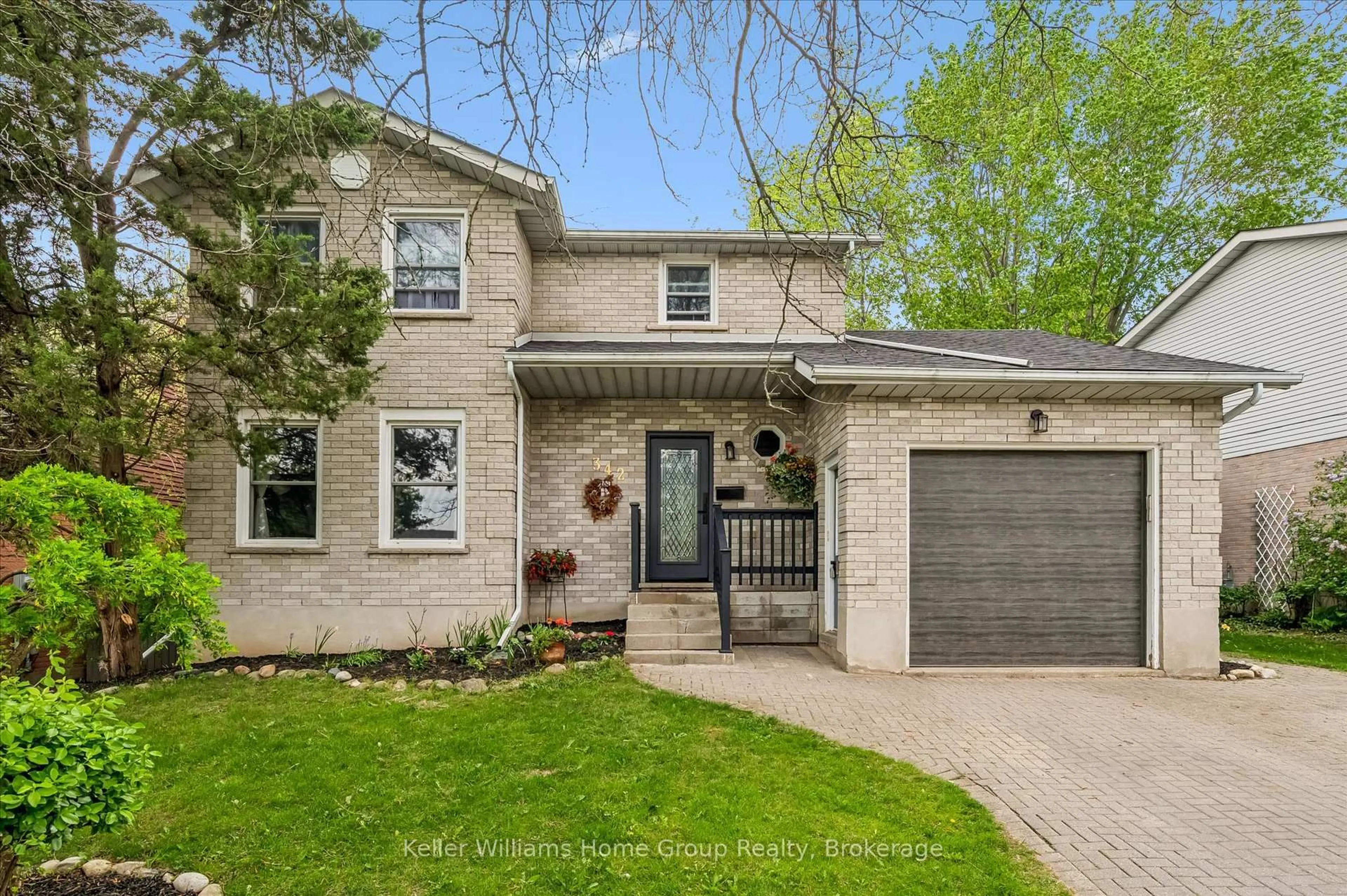 Home with brick exterior material, street for 342 Ironwood Rd, Guelph Ontario N1G 3N8