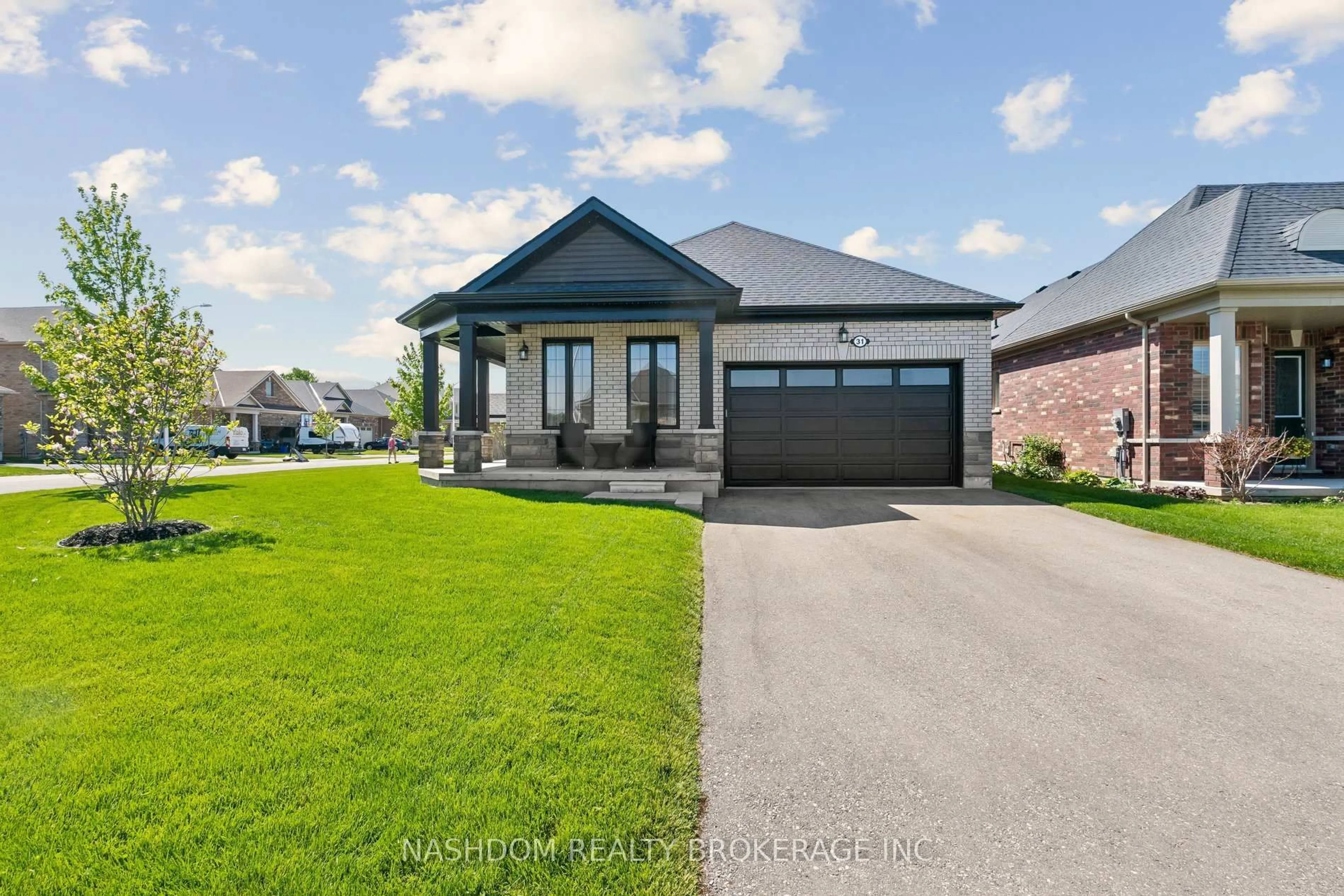 Home with brick exterior material, street for 31 Seaton Cres, Tillsonburg Ontario N4G 0J8