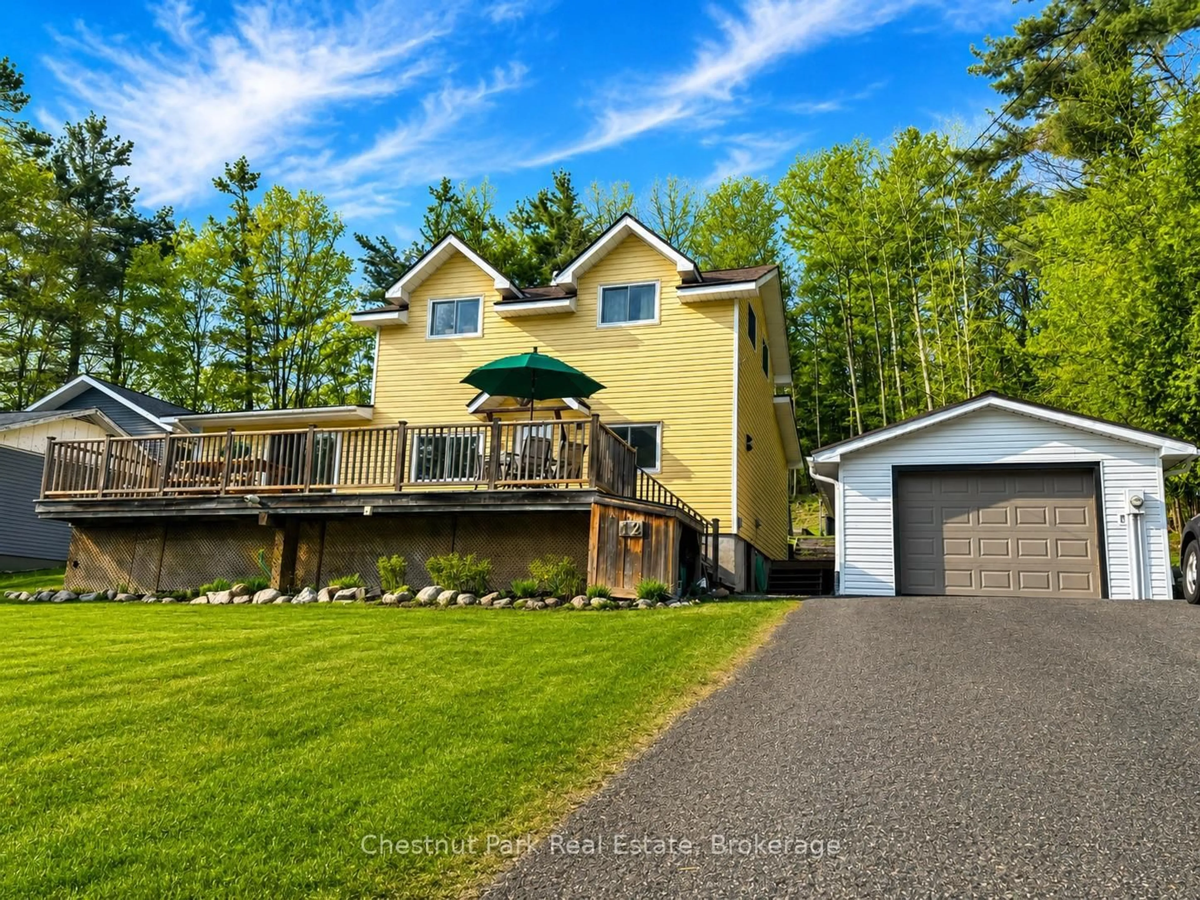A pic from outside/outdoor area/front of a property/back of a property/a pic from drone, water/lake/river/ocean view for 12 Ferndale Rd, Muskoka Lakes Ontario P0B 1J0