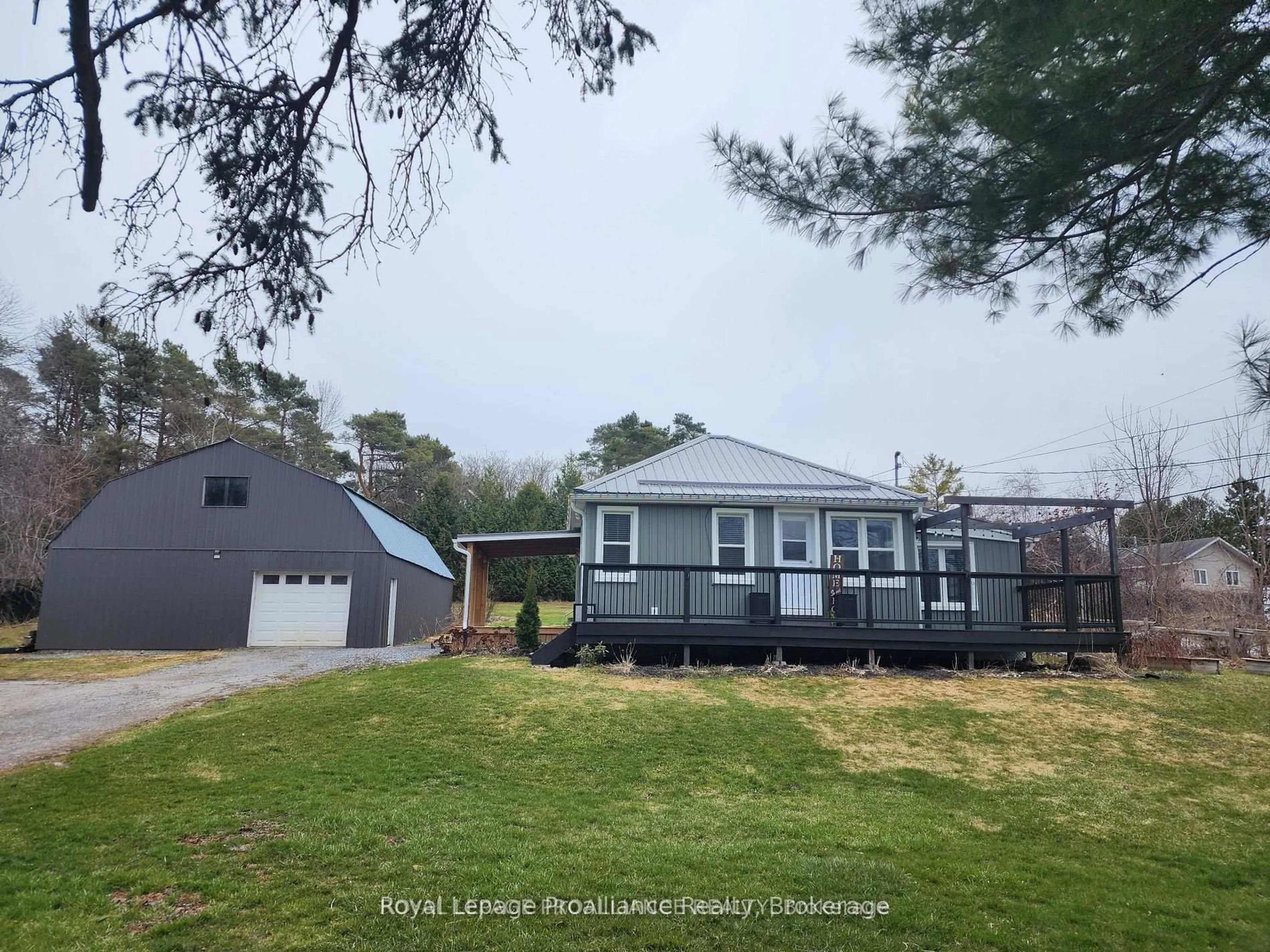 A pic from outside/outdoor area/front of a property/back of a property/a pic from drone, unknown for 2307 County Rd 3, Prince Edward County Ontario K0K 1L0