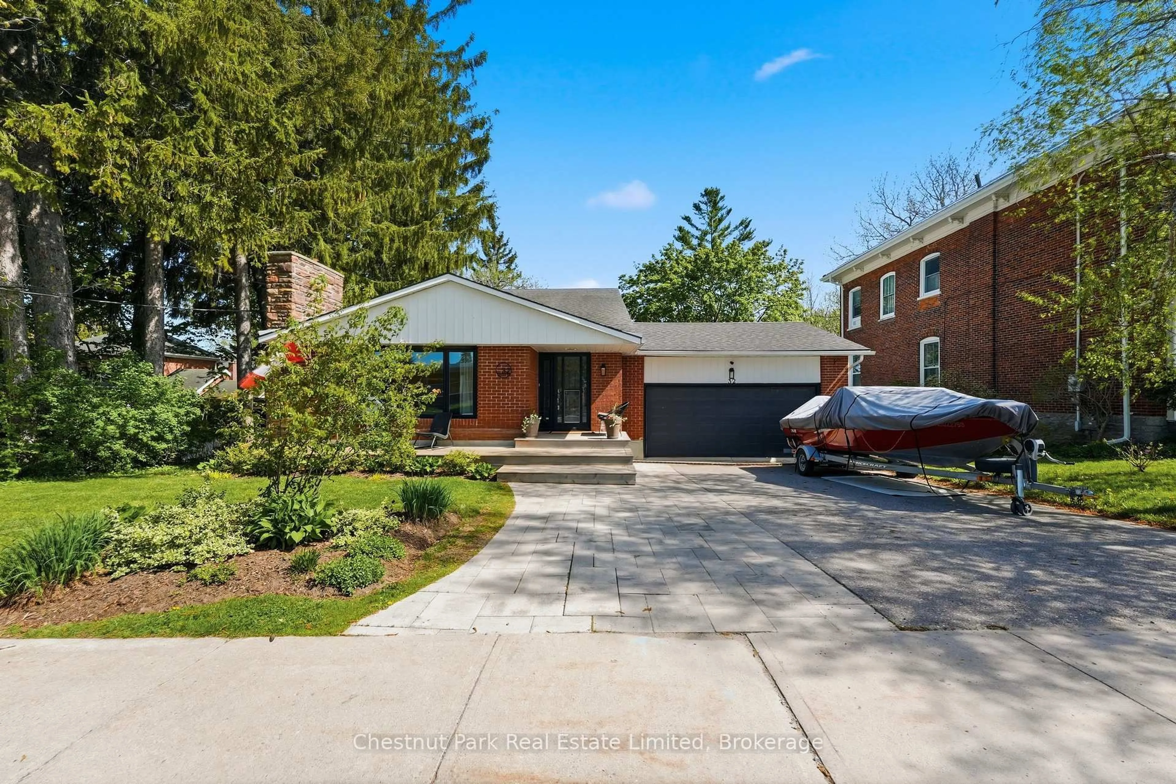 Home with brick exterior material, street for 32 Barker St, Prince Edward County Ontario K0K 2T0