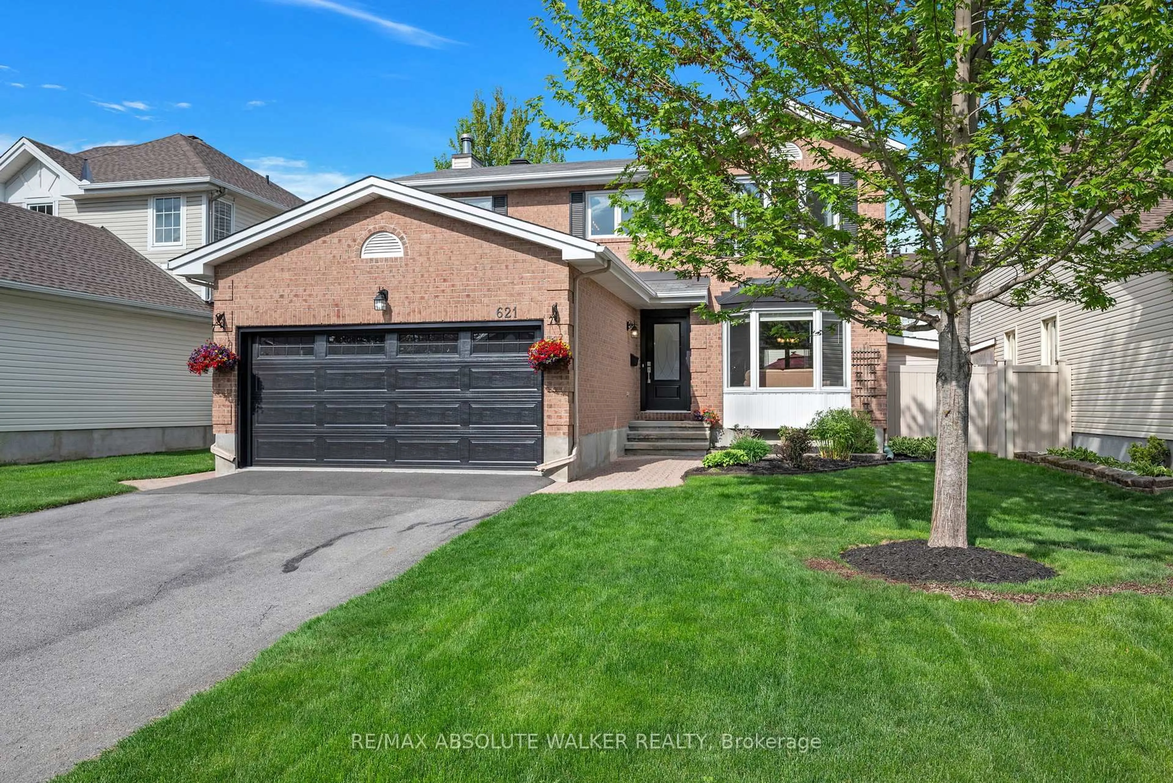 Home with brick exterior material, street for 621 Arc-En-Ciel St, Ottawa Ontario K4A 3H9