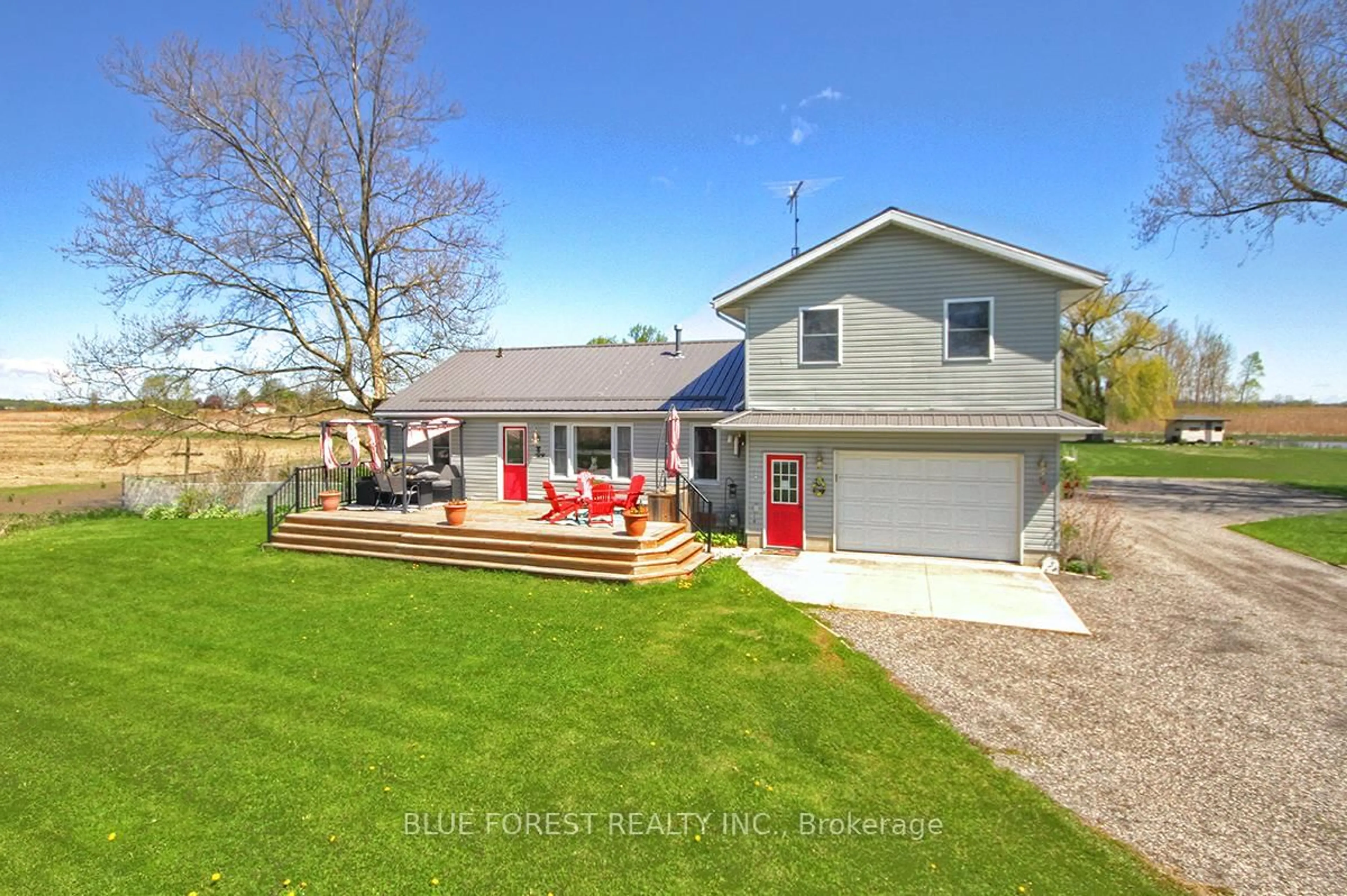 A pic from outside/outdoor area/front of a property/back of a property/a pic from drone, street for 18487 Raglan Rd, Chatham-Kent Ontario N0P 1A0