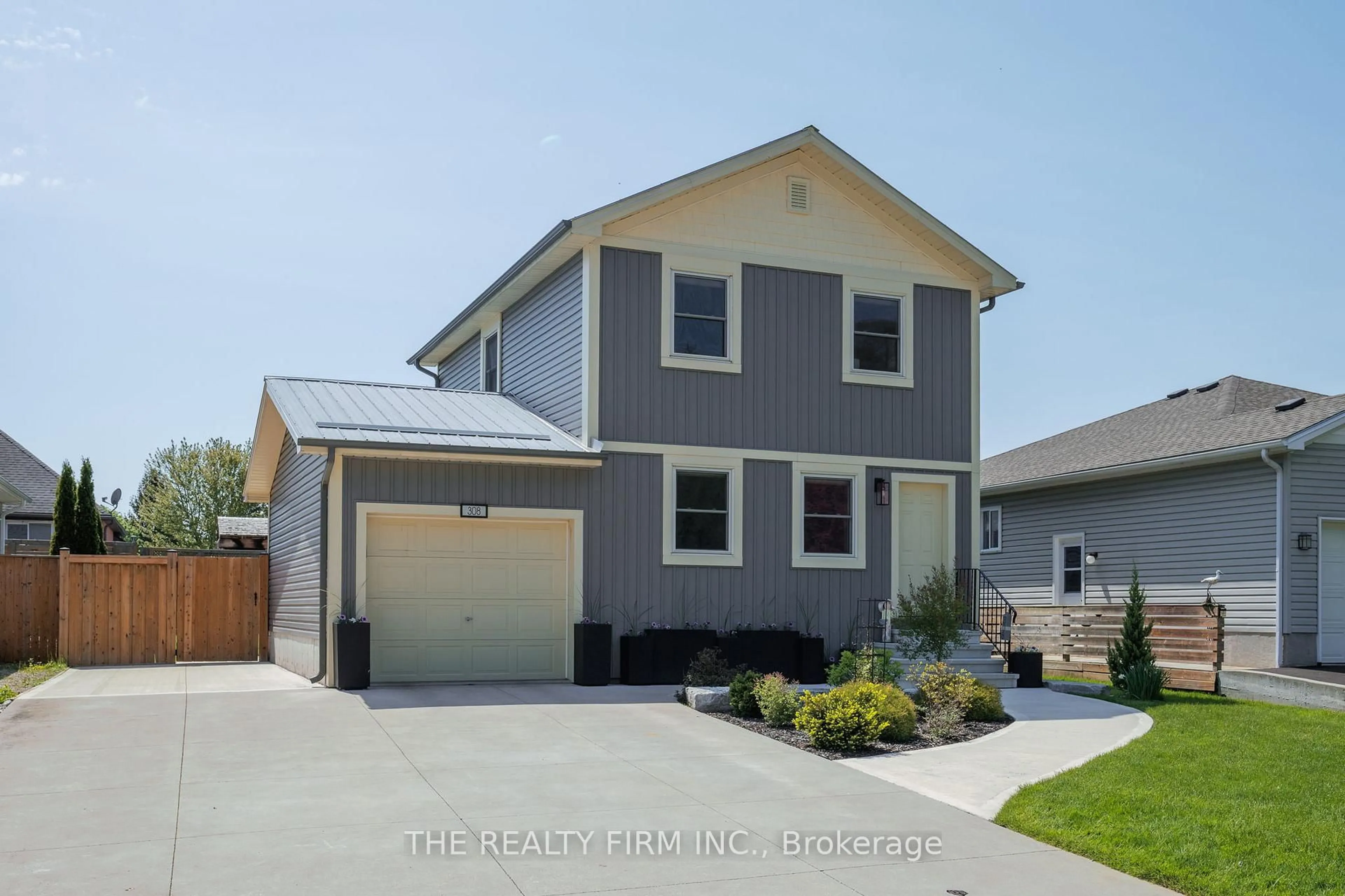 Home with vinyl exterior material, street for 308 Selbourne Dr, Central Elgin Ontario N5L 1B1