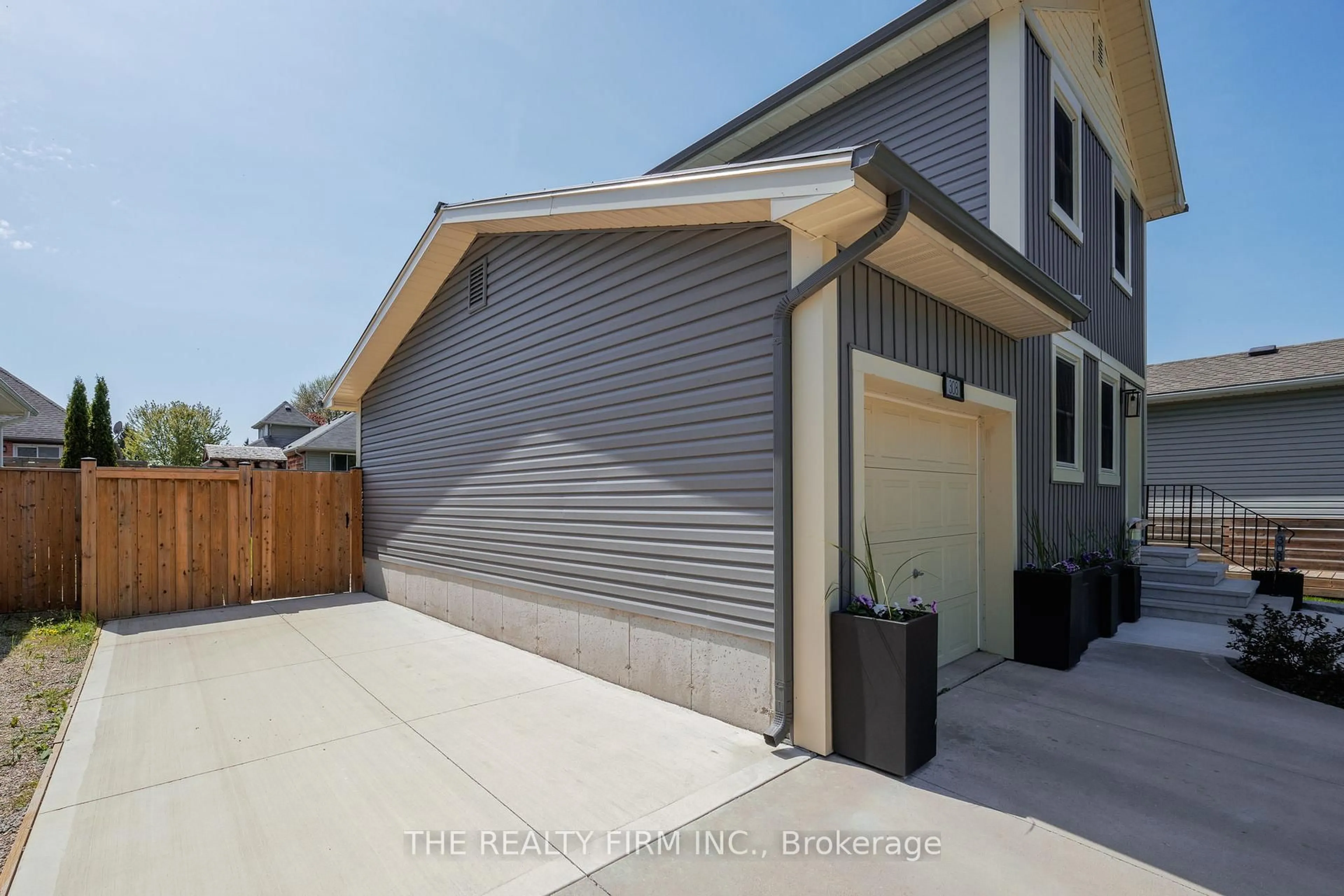 Home with vinyl exterior material, street for 308 Selbourne Dr, Central Elgin Ontario N5L 1B1