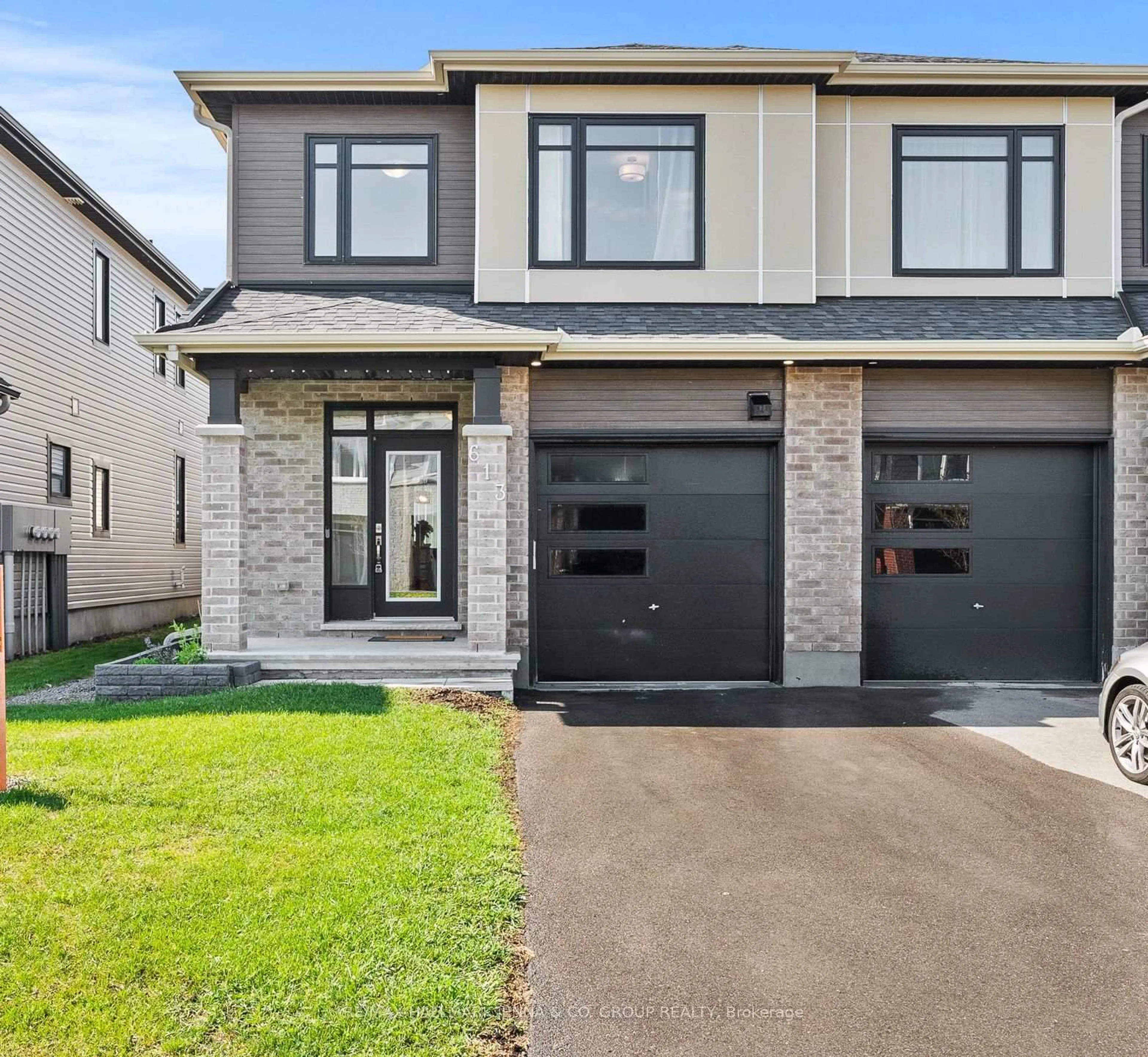 Home with brick exterior material, street for 613 Taliesin Cres, Ottawa Ontario K2S 2W5