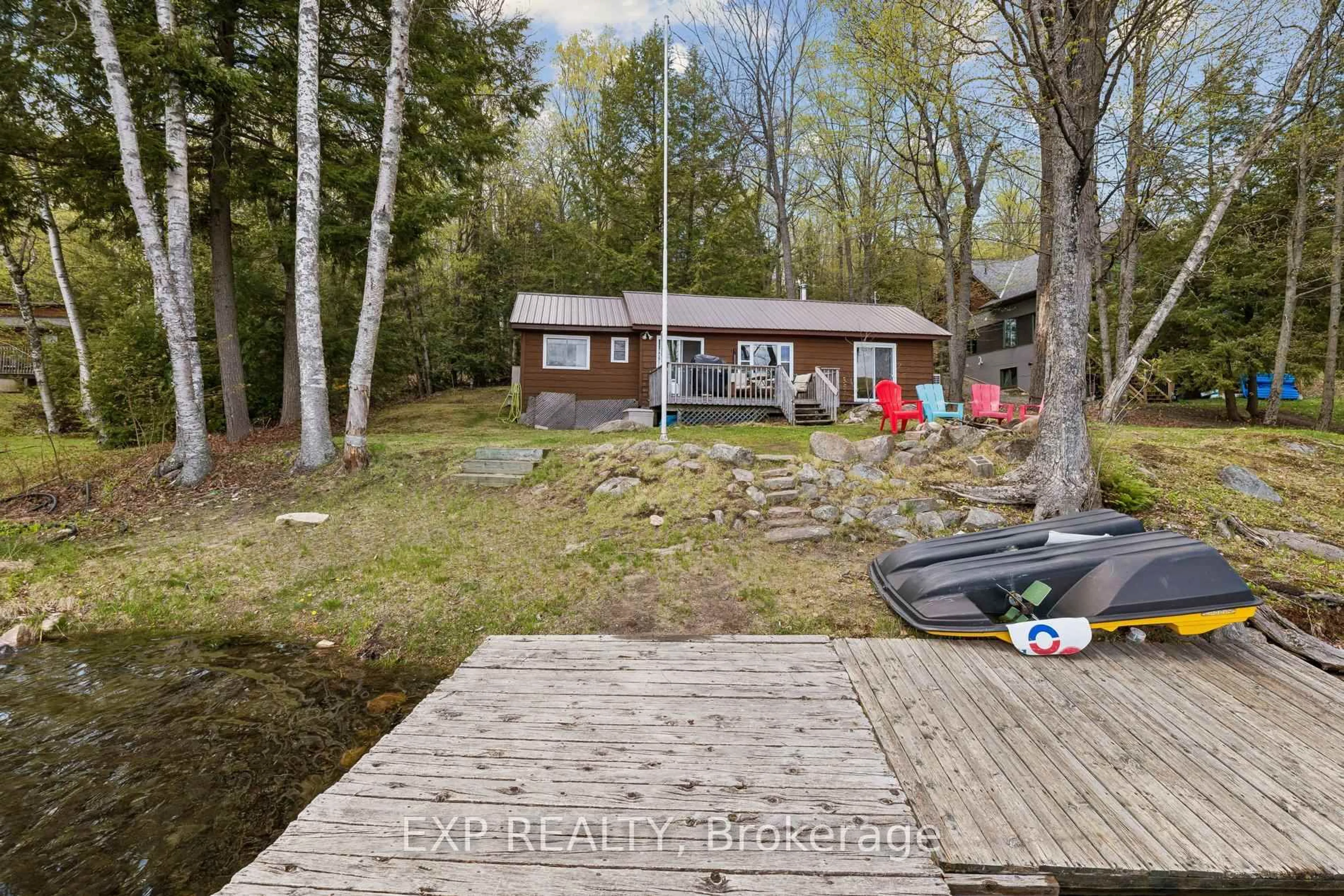 A pic from outside/outdoor area/front of a property/back of a property/a pic from drone, water/lake/river/ocean view for 1216 Lake Lorraine (Tory Lake) Lane, Highlands East Ontario K0L 2Y0