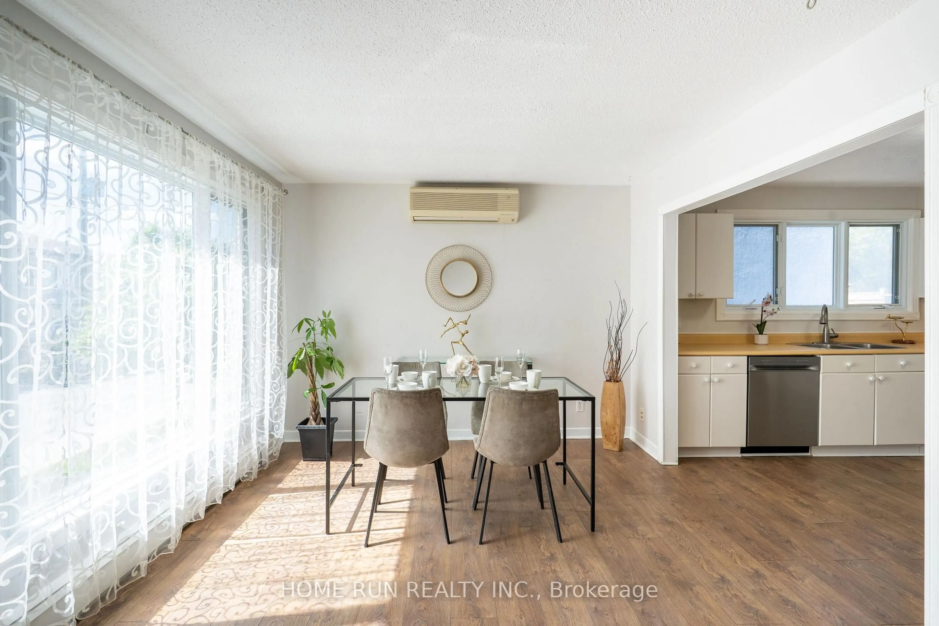Dining room, wood/laminate floor for 313 Savard Ave, Ottawa Ontario K1L 7S1