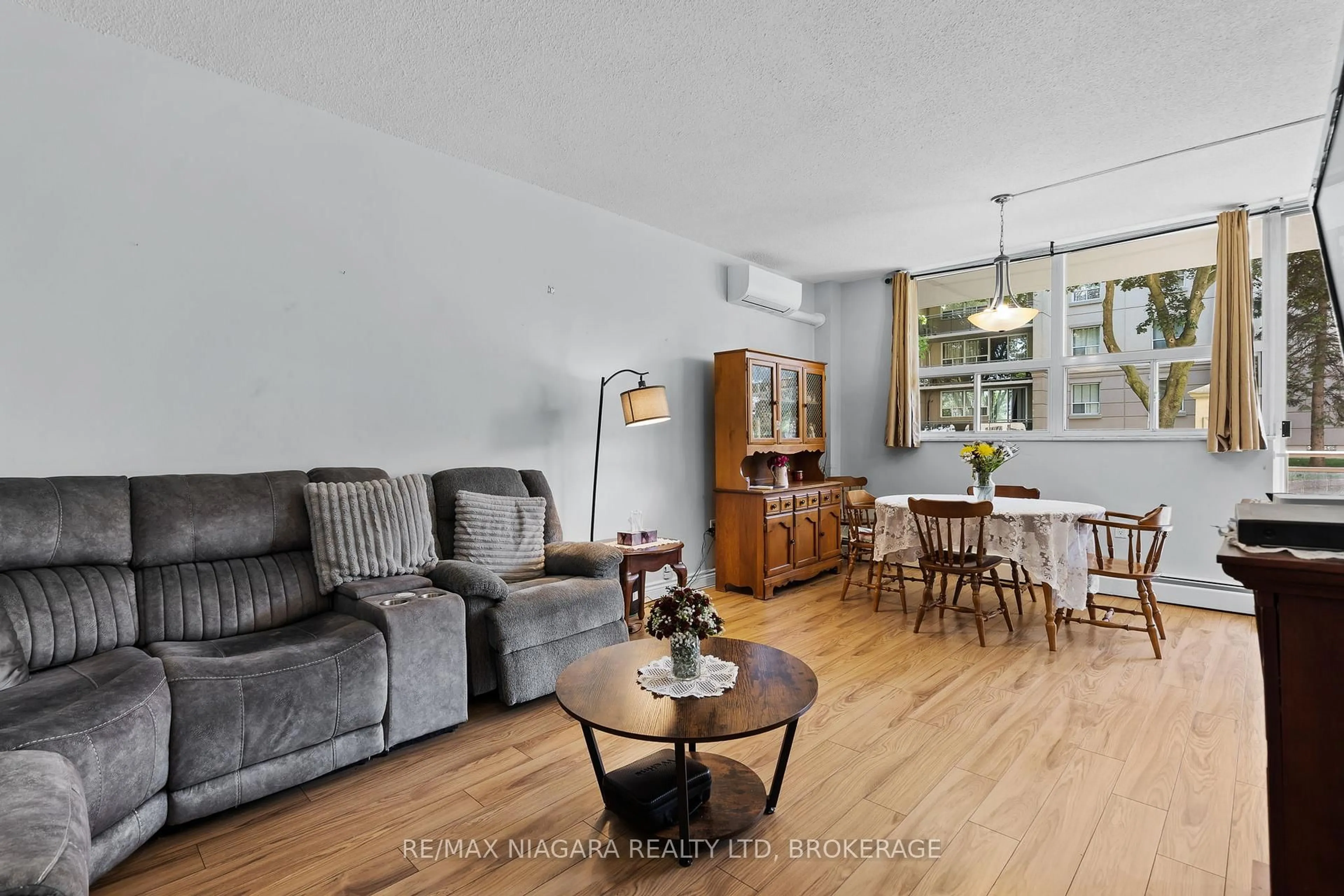 Living room with furniture, unknown for 6390 Huggins St #107, Niagara Falls Ontario L2J 1H1