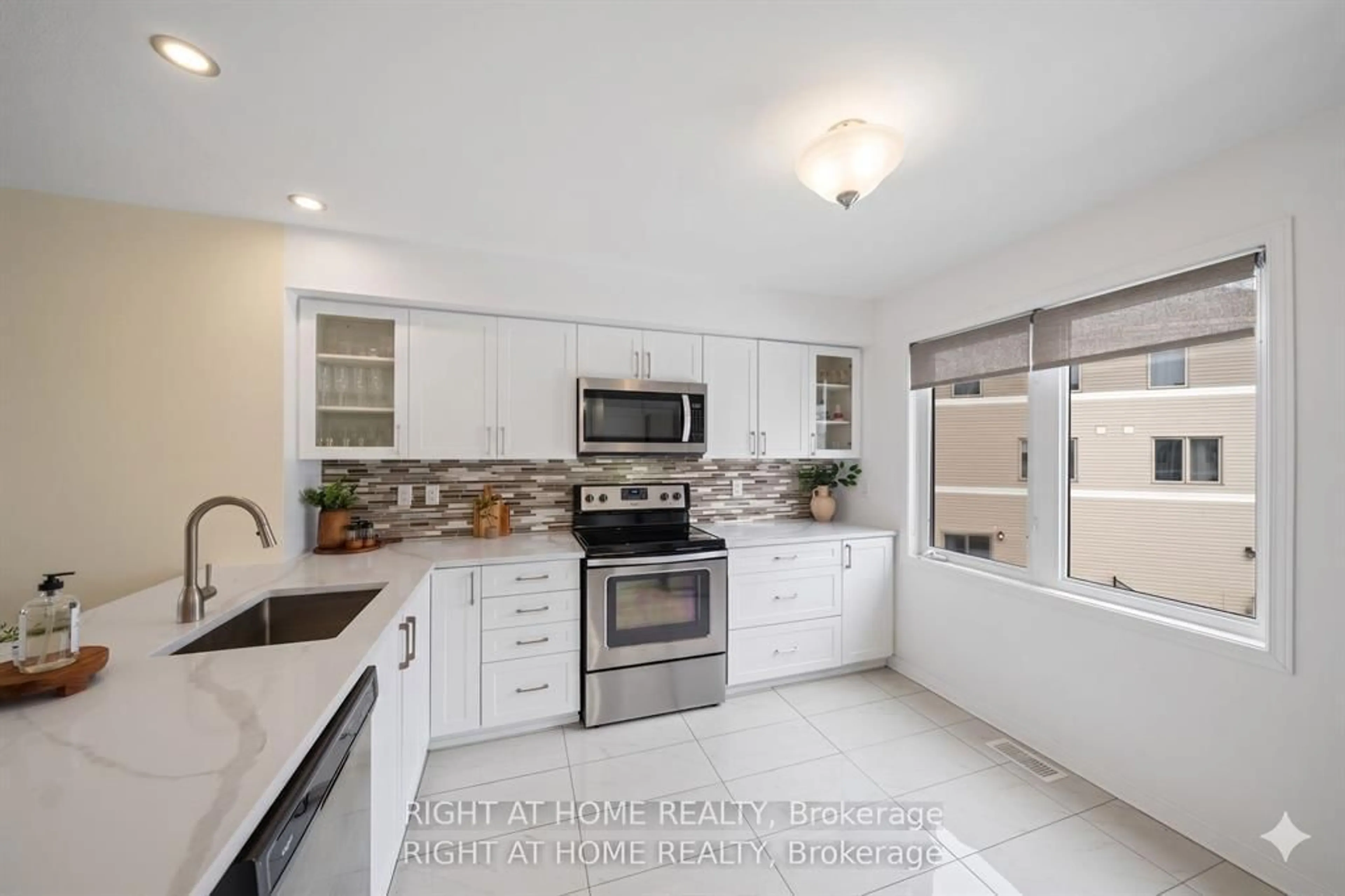 Open concept kitchen, ceramic/tile floor for 161 CAMDEN Private, Ottawa Ontario K2J 6J1