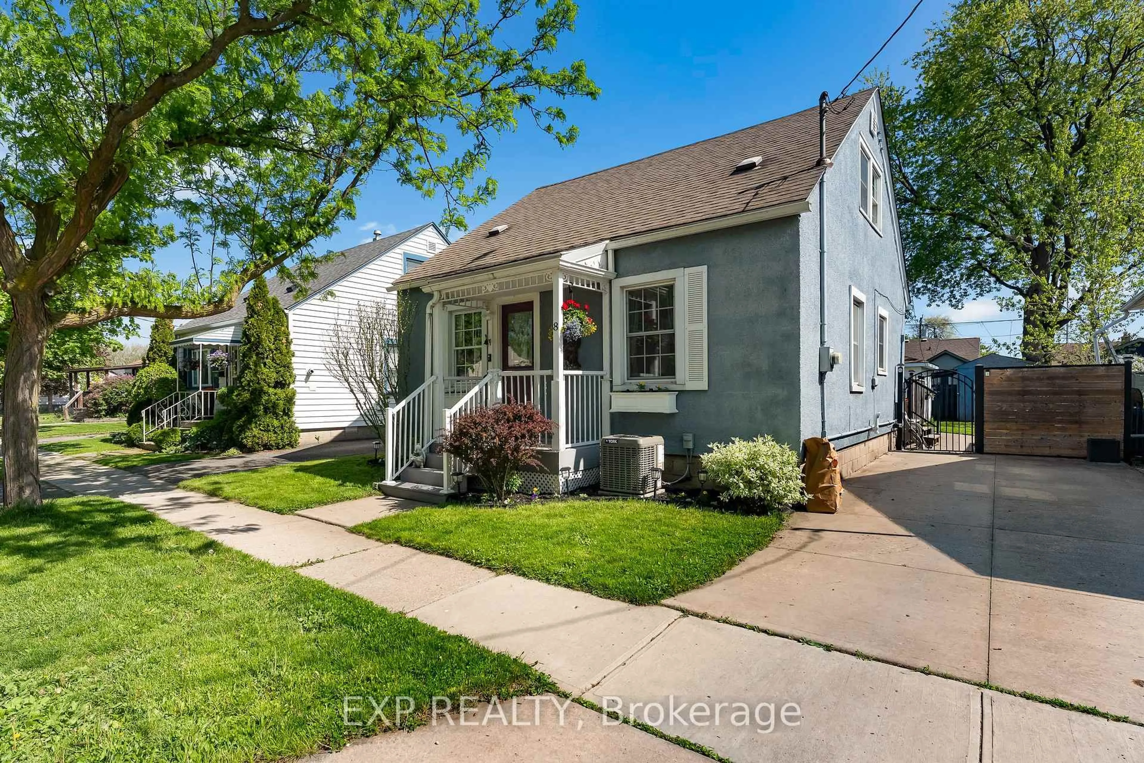 Home with vinyl exterior material, street for 8 Coventry St, St. Catharines Ontario L2R 2X5