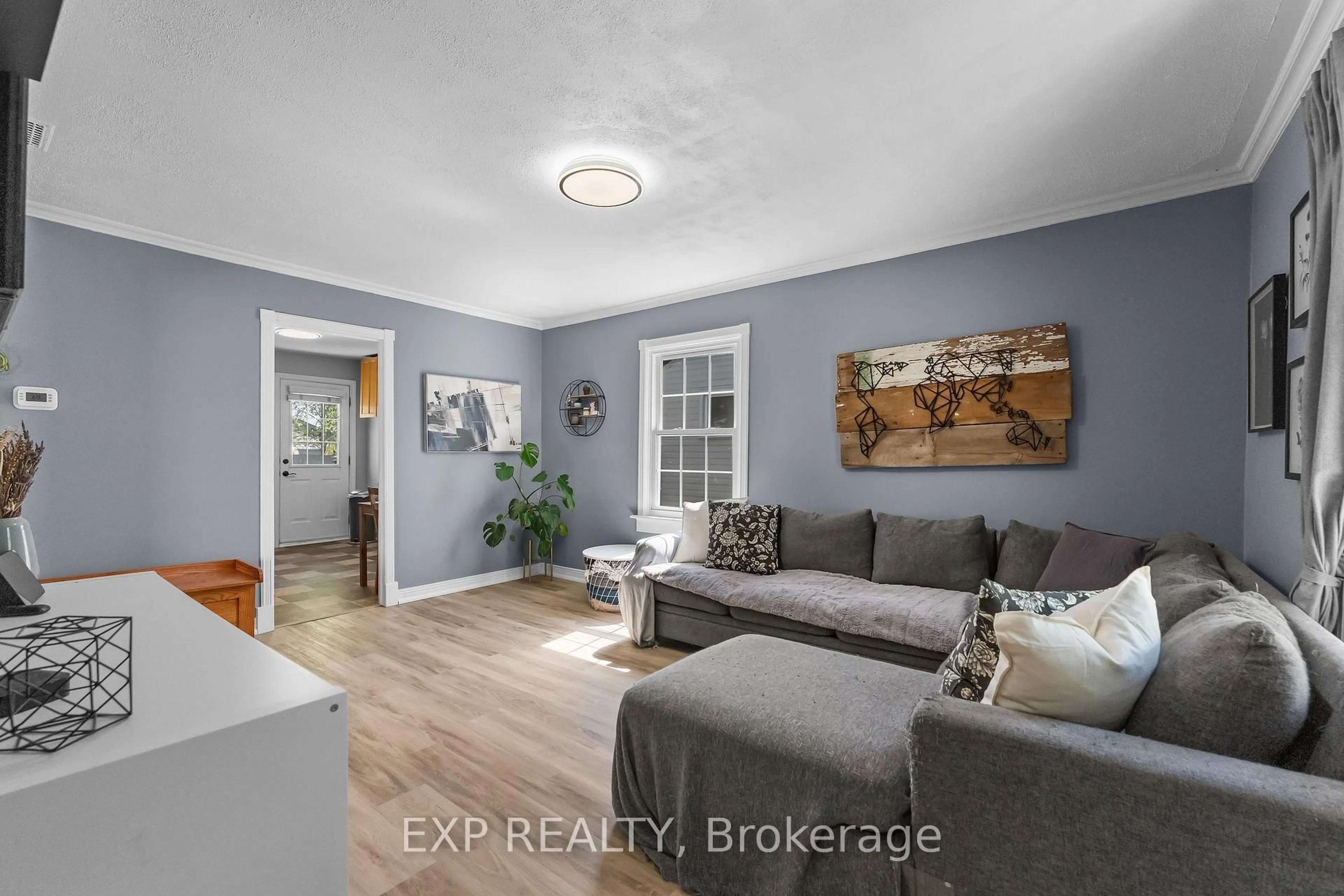 Living room with furniture, unknown for 8 Coventry St, St. Catharines Ontario L2R 2X5