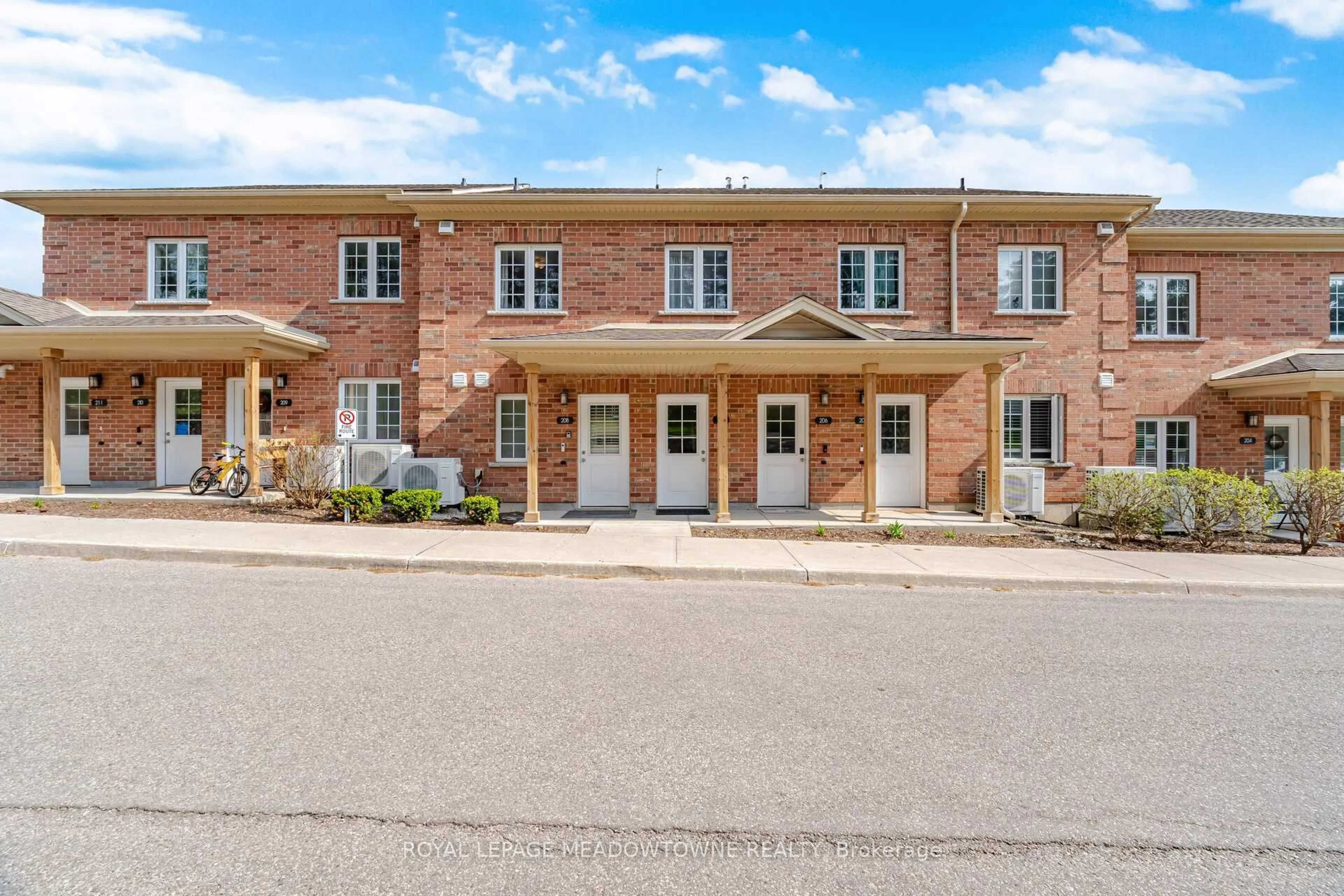 Home with brick exterior material, street for 7 Cityview Dr #207, Guelph Ontario N1E 0R1