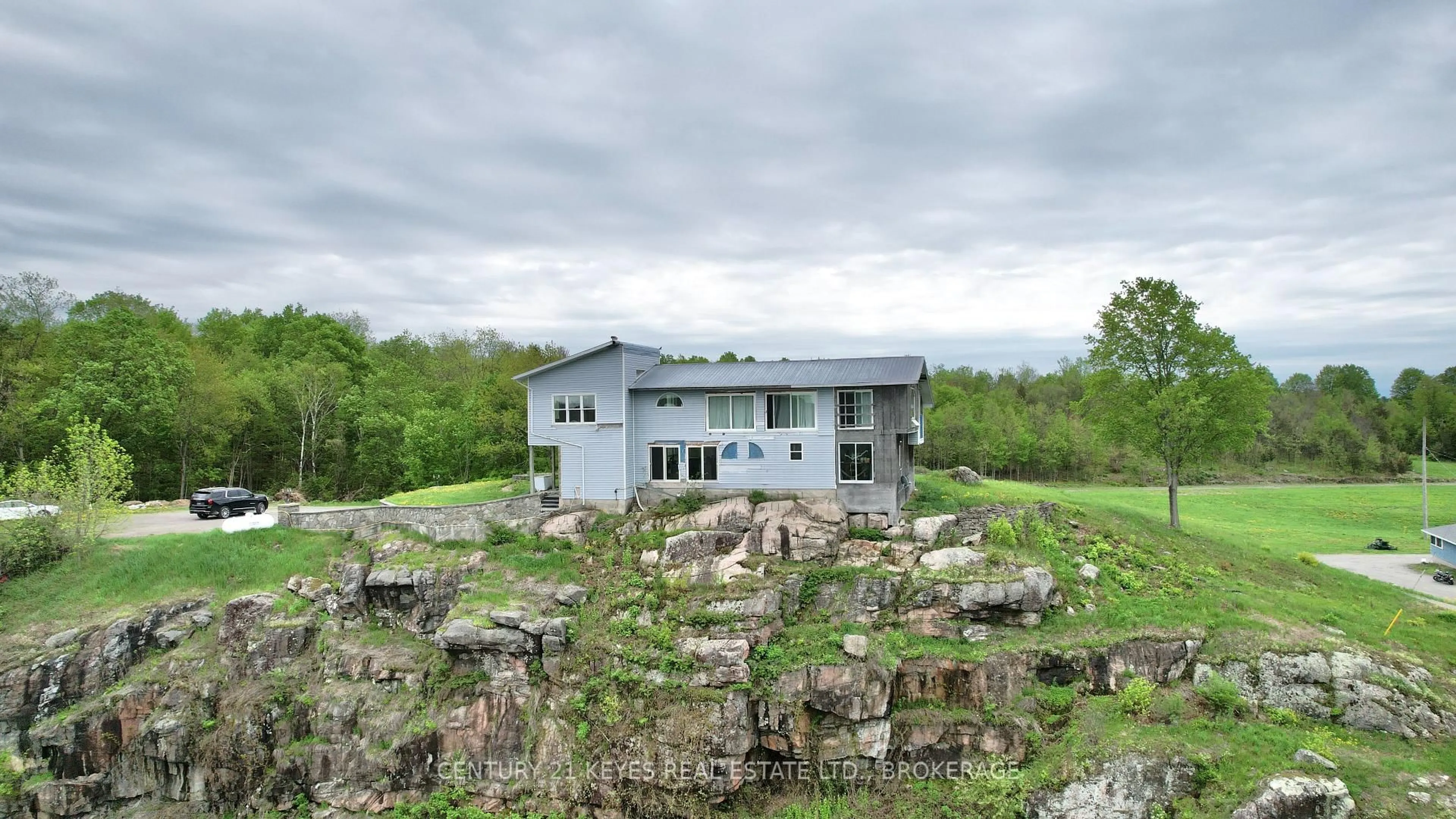 A pic from outside/outdoor area/front of a property/back of a property/a pic from drone, building for 151 County Rd 5 Rd, Front of Yonge Ontario K0E 1R0