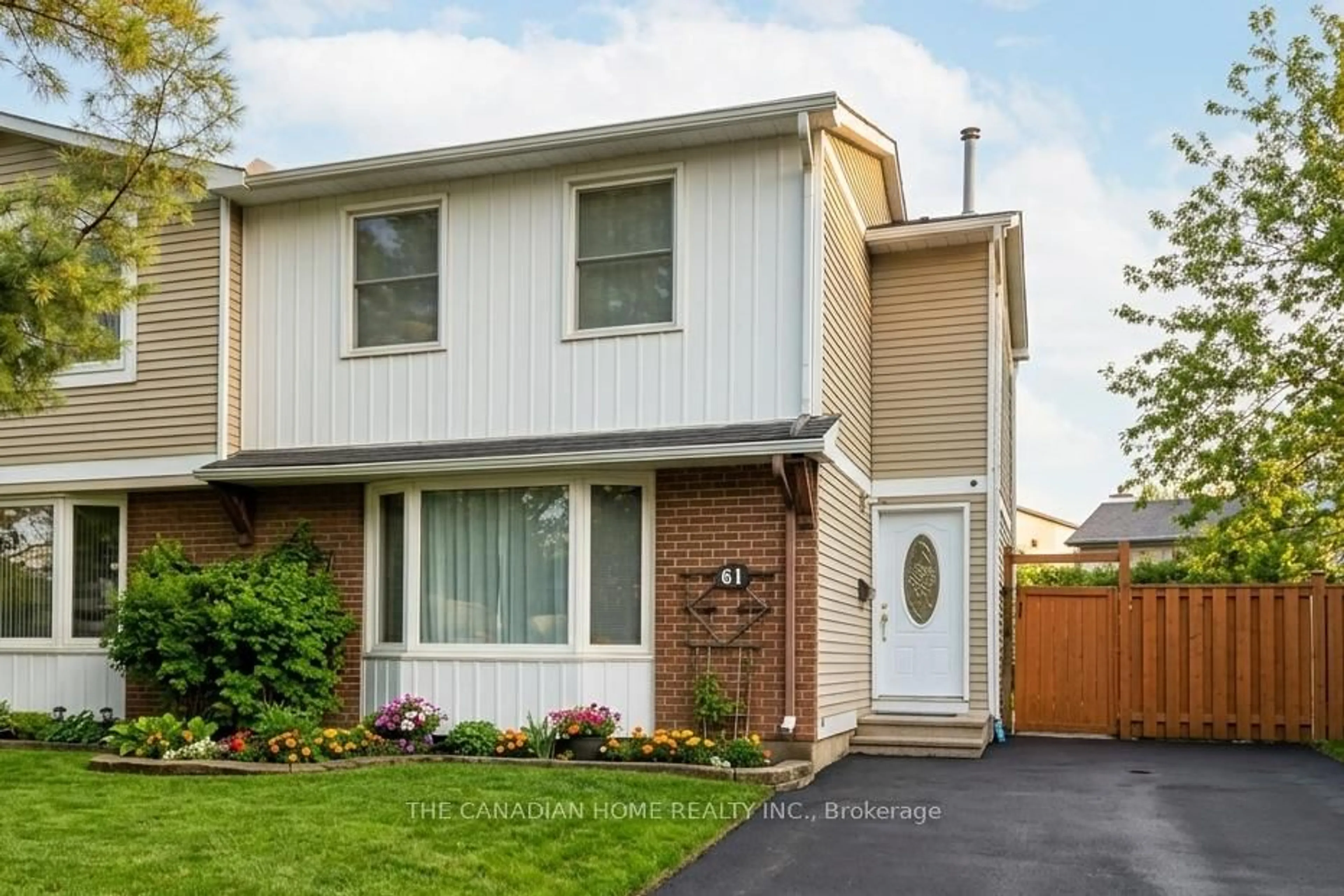 Home with vinyl exterior material, street for 61 EXETER Dr, Barrhaven Ontario K2J 1V6