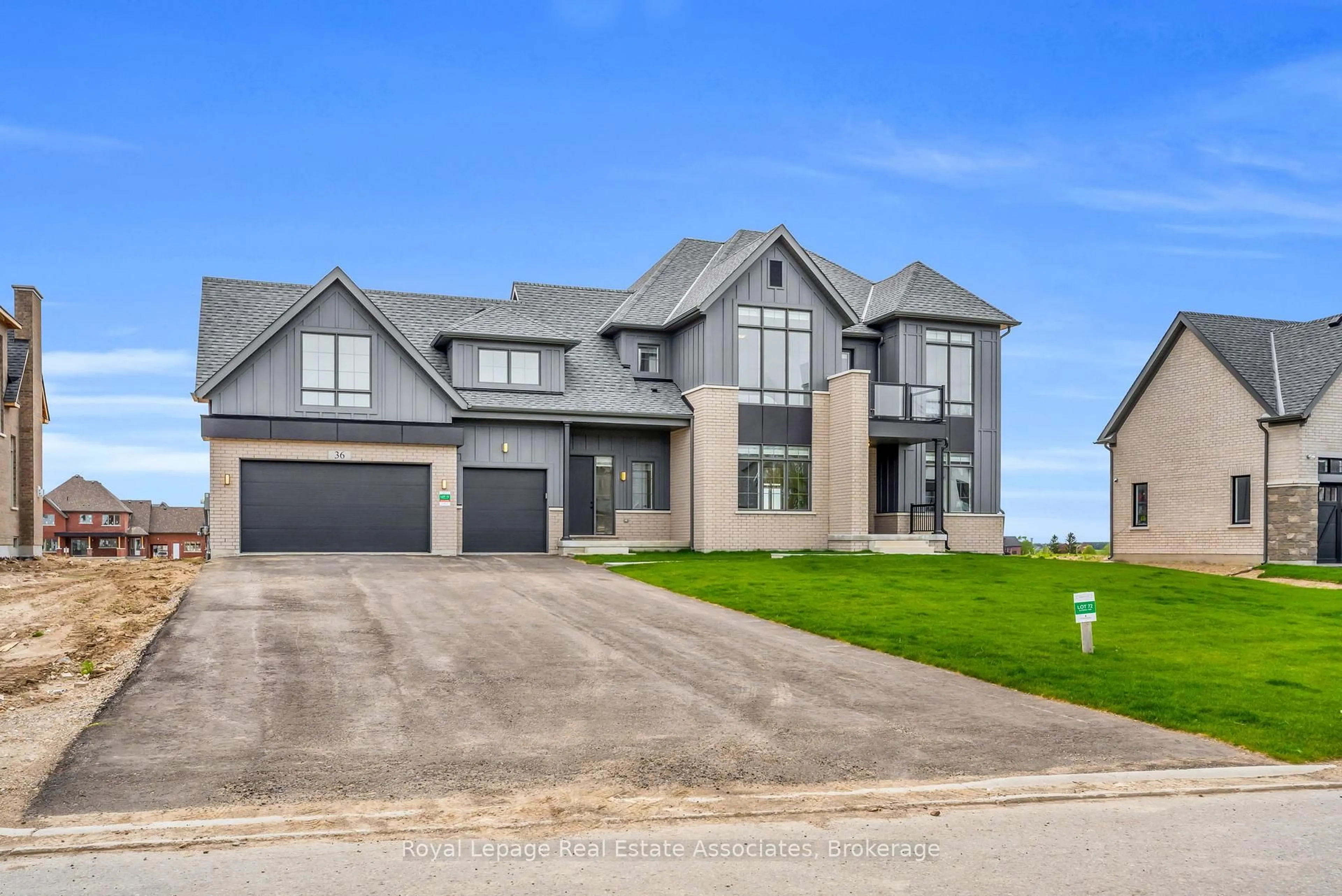 Home with brick exterior material, street for 36 Ewing Way, Amaranth Ontario L9W 7V6