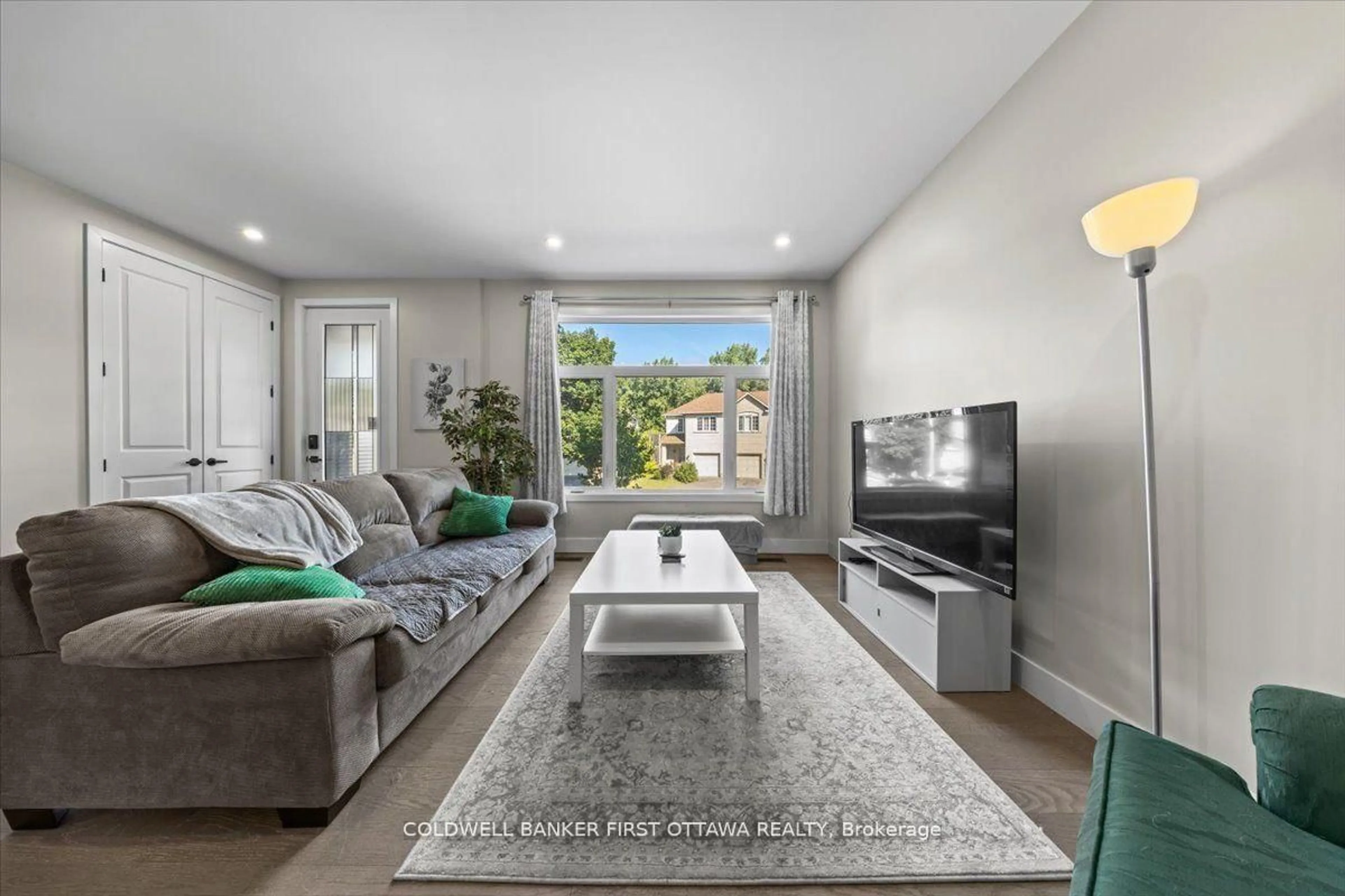 Living room with furniture, unknown for 22 Inverkip Ave #A/B, Ottawa Ontario K1T 4B7