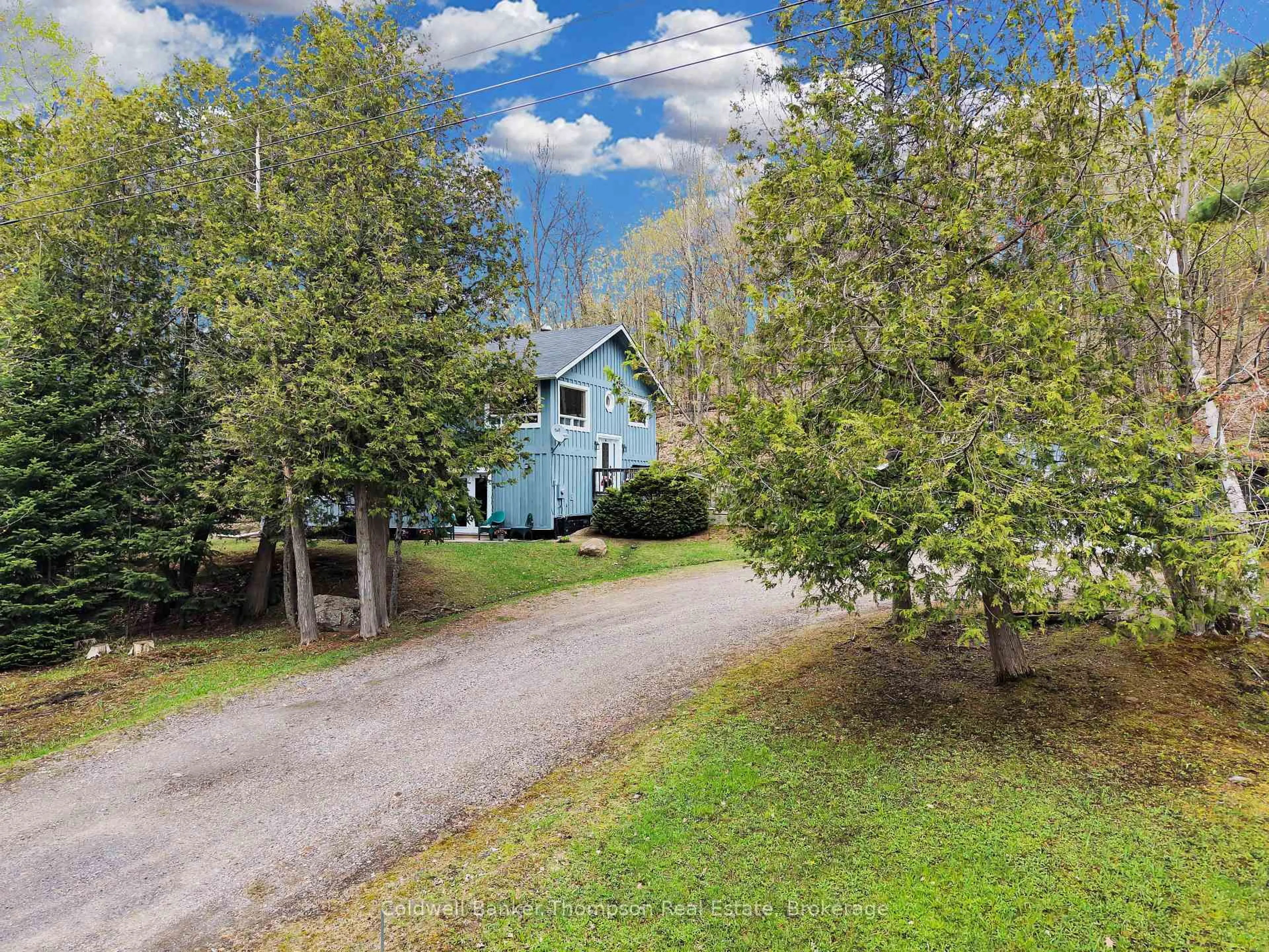 A pic from outside/outdoor area/front of a property/back of a property/a pic from drone, unknown for 779 Old Muskoka Rd, Huntsville Ontario P0B 1M0