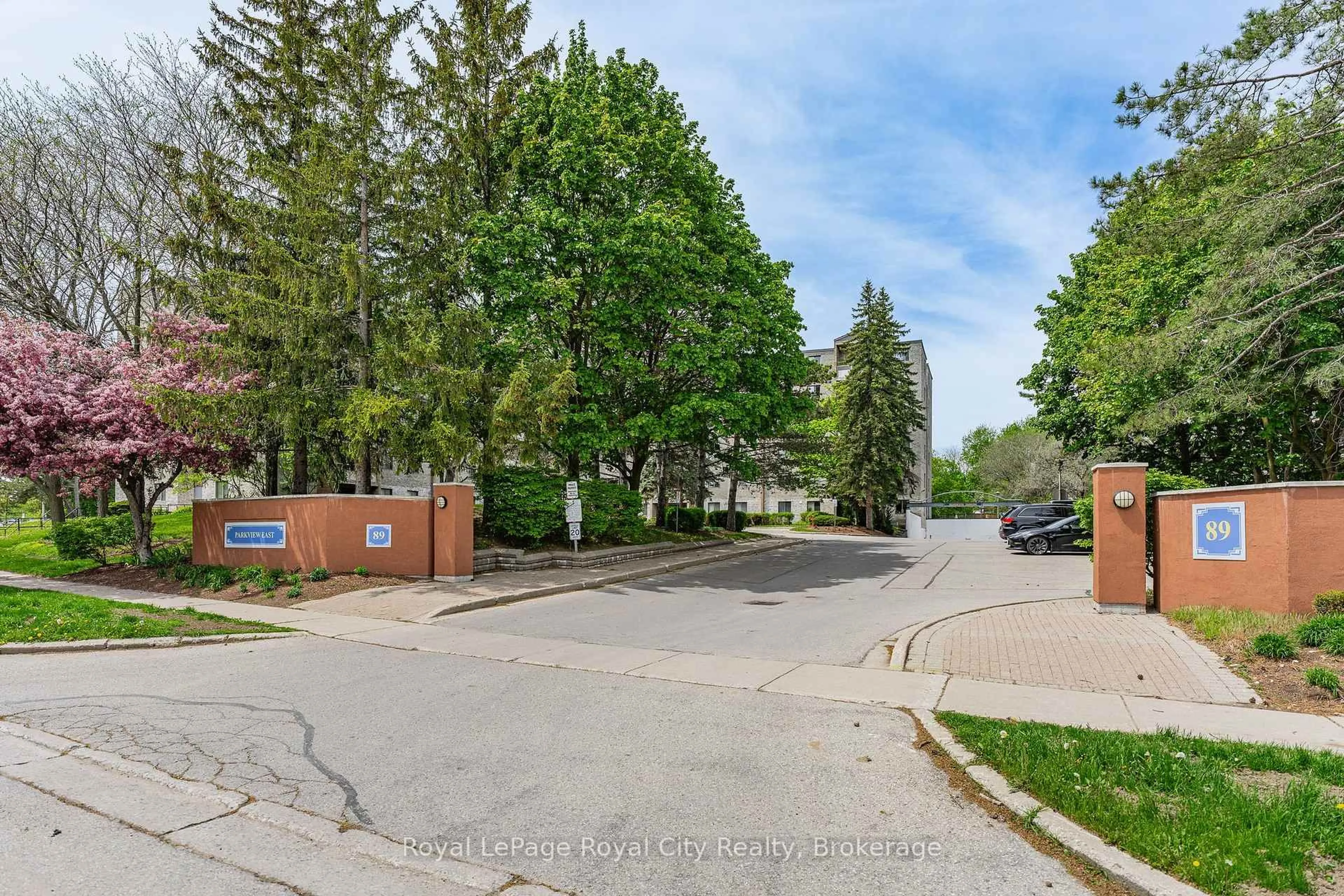 A pic from outside/outdoor area/front of a property/back of a property/a pic from drone, street for 89 Westwood Rd #407, Guelph Ontario N1H 7J6