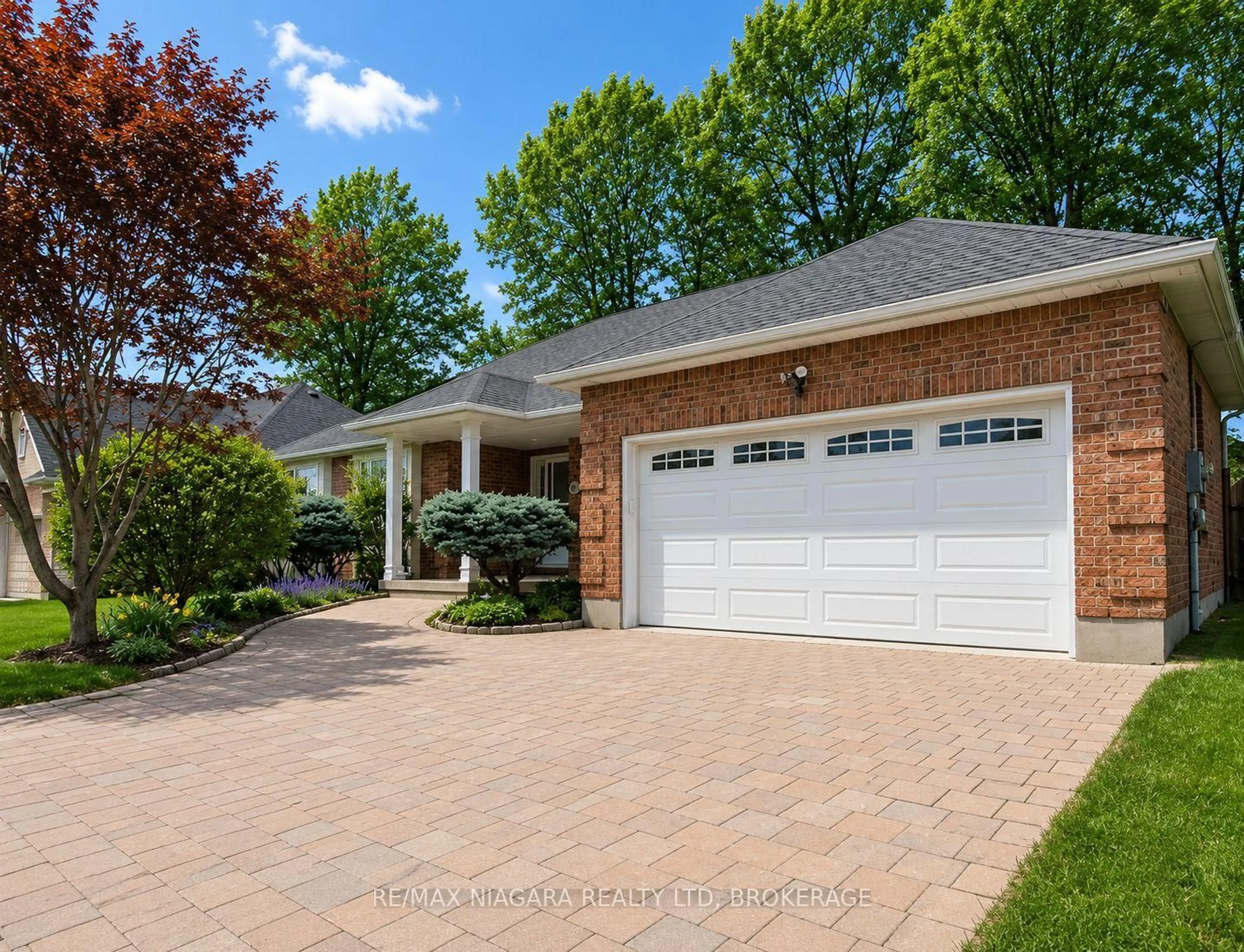Home with brick exterior material, street for 8165 Mount Olive Cres, Niagara Falls Ontario L2H 2Y9