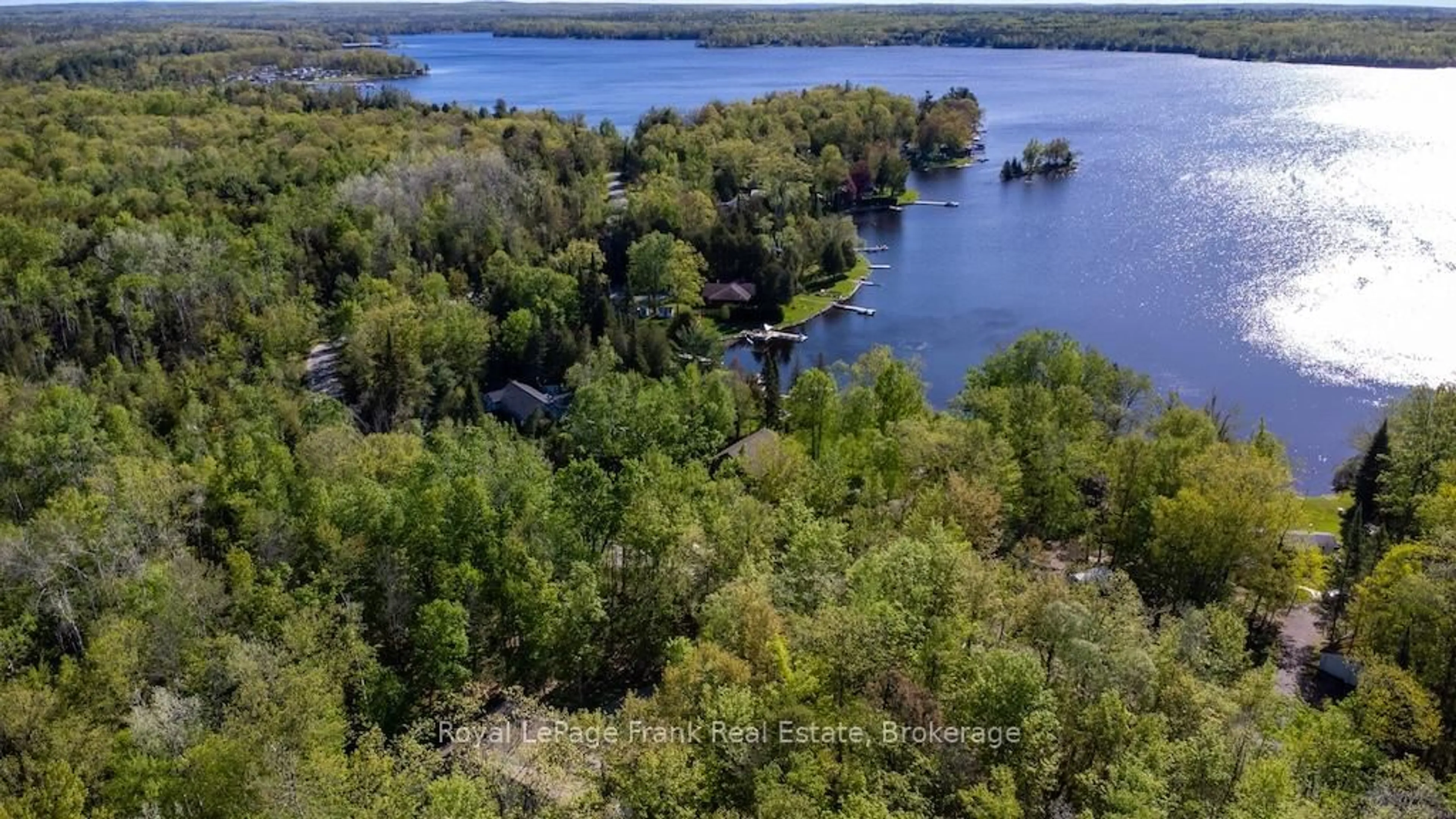 A pic from outside/outdoor area/front of a property/back of a property/a pic from drone, water/lake/river/ocean view for 57 Mystic Point Rd, Trent Lakes Ontario K0L 1J0
